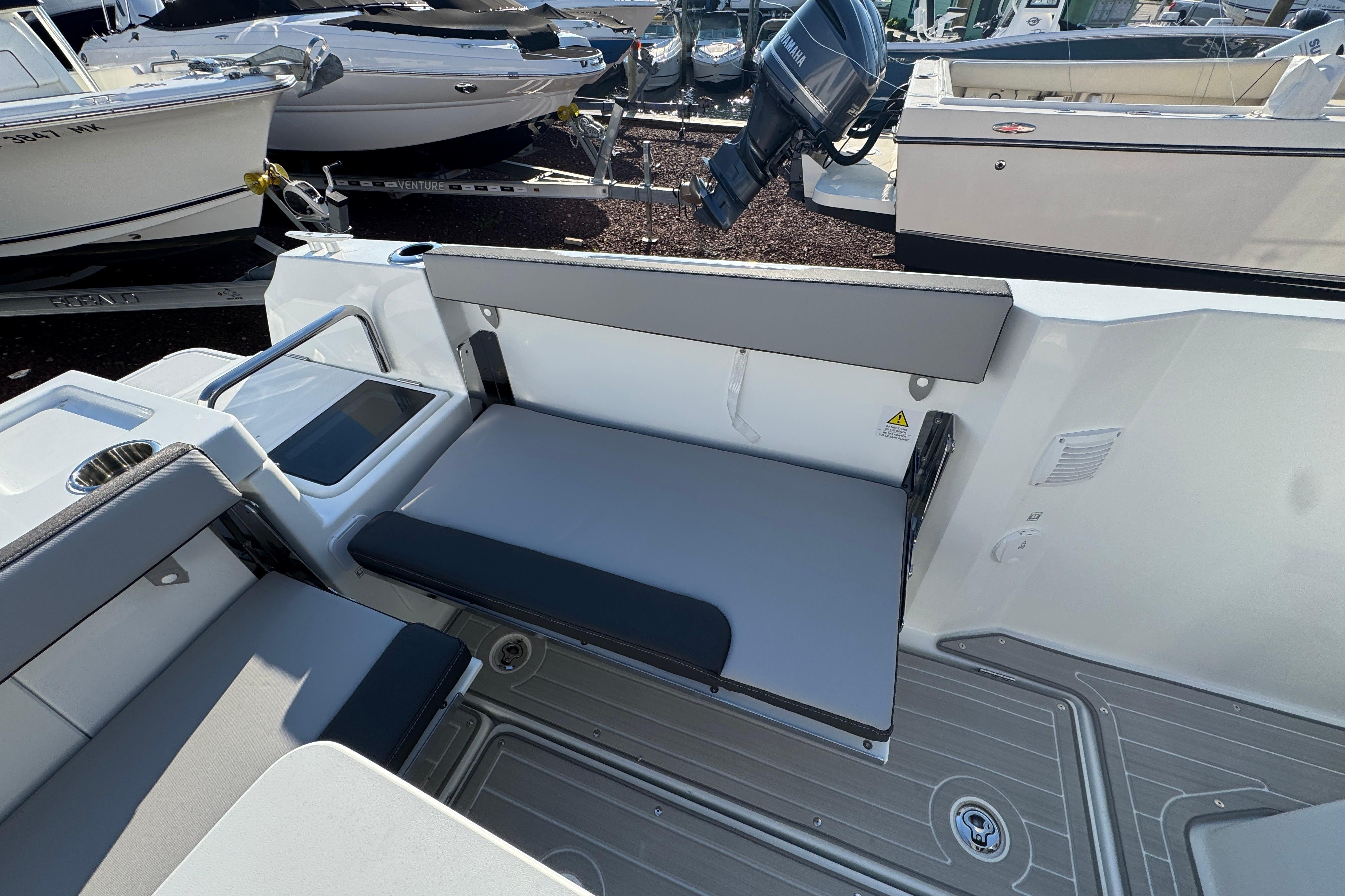2026 Jeanneau NC Sport 795 Series 2 boat interior with foldable seating and modern design.