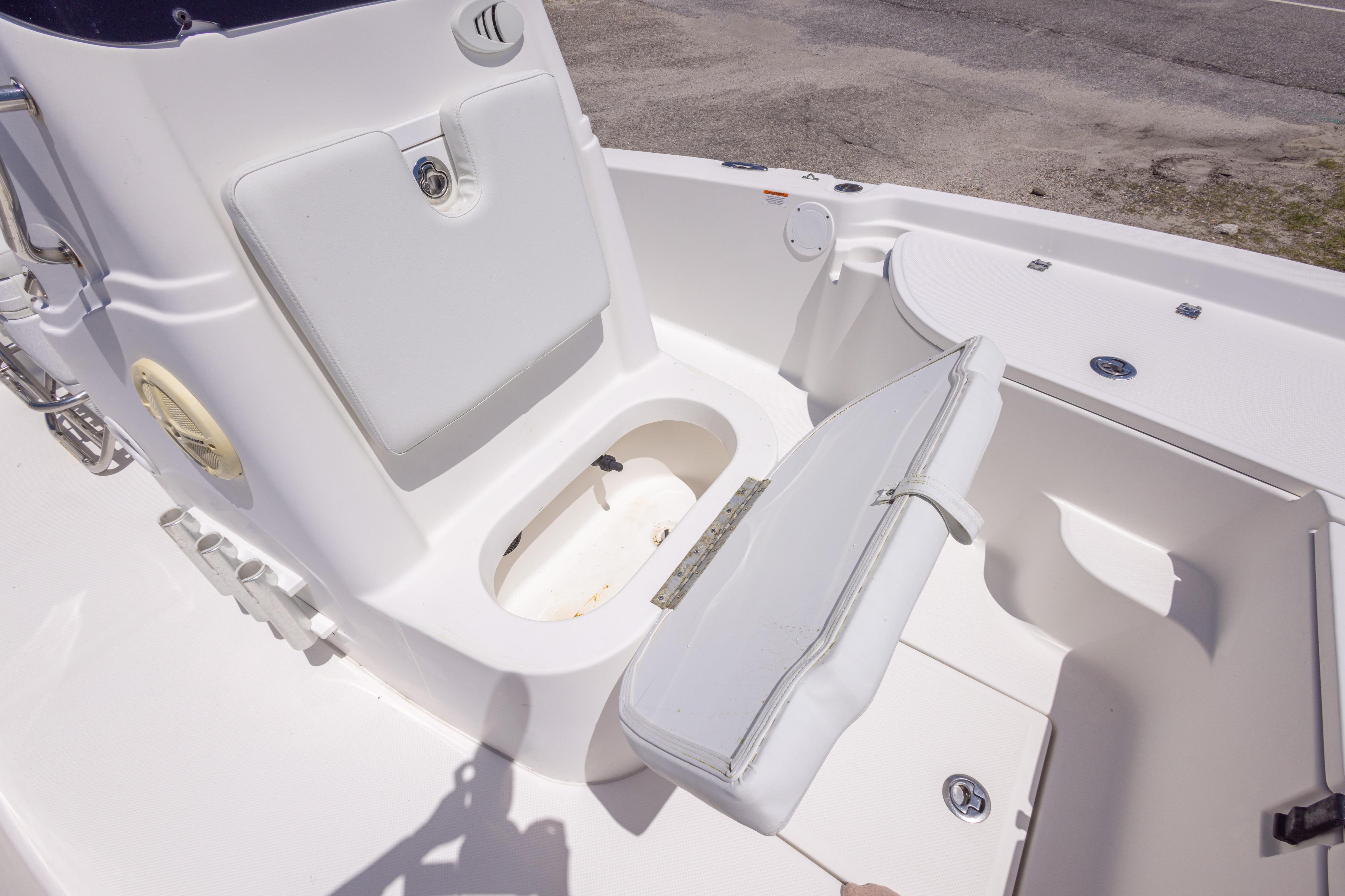 2011 Sea Fox 200XT boat interior with open storage compartment and seating.