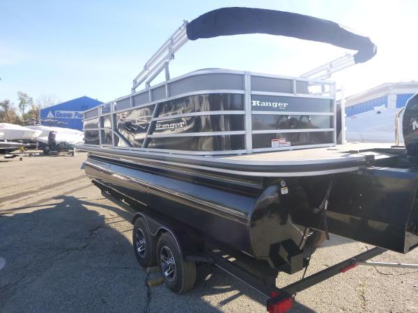 2024 Ranger Reata 223C pontoon boat on trailer, outdoor display.