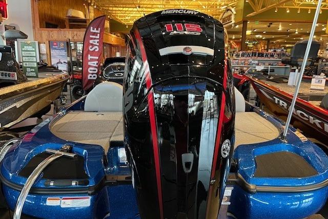 Blue Nitro Z17 boat with Mercury 115 engine, showcased in a boat sale event.