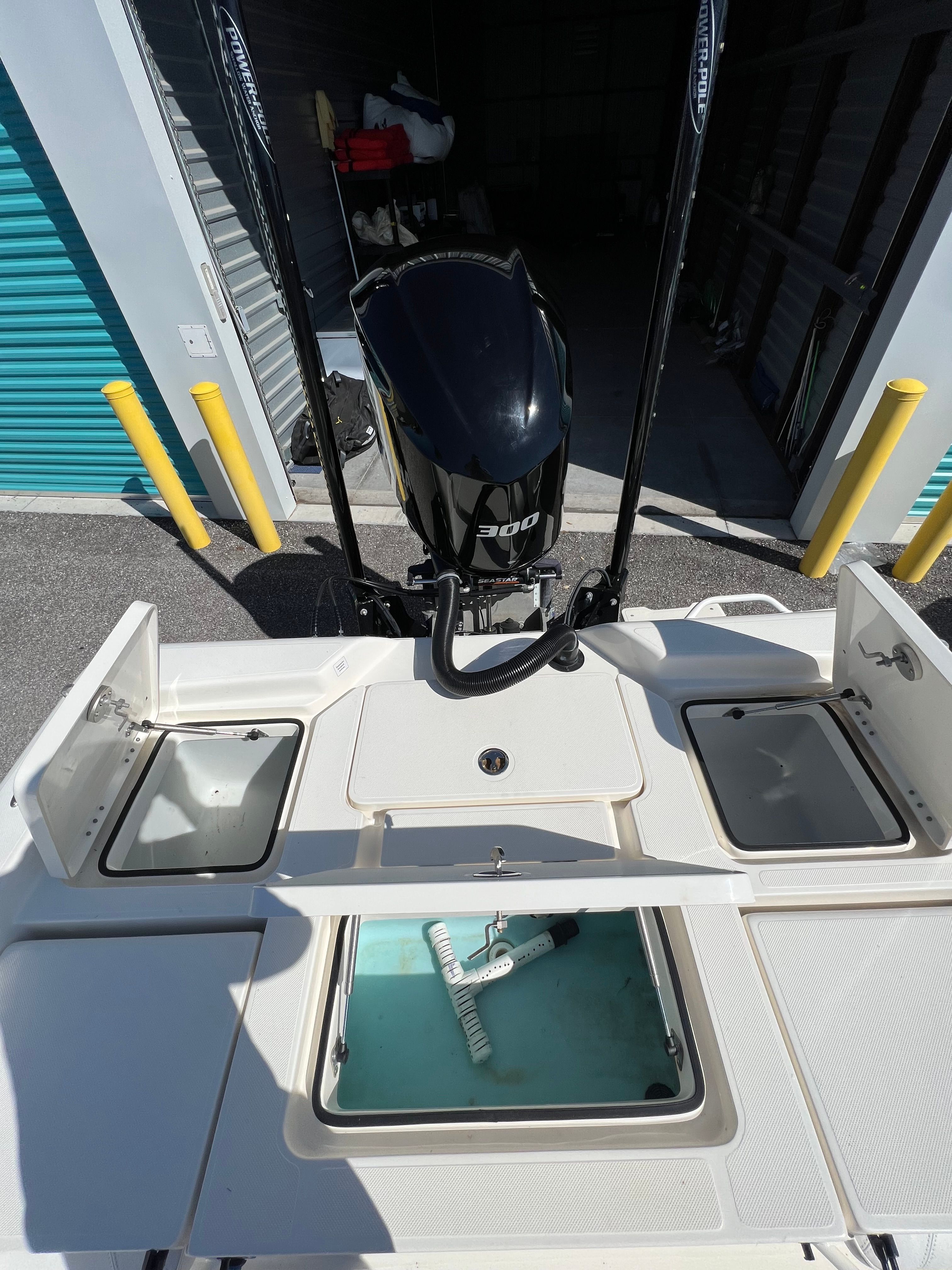 The image shows the stern of a 2020 Skeeter SX240 boat with an outboard motor.
