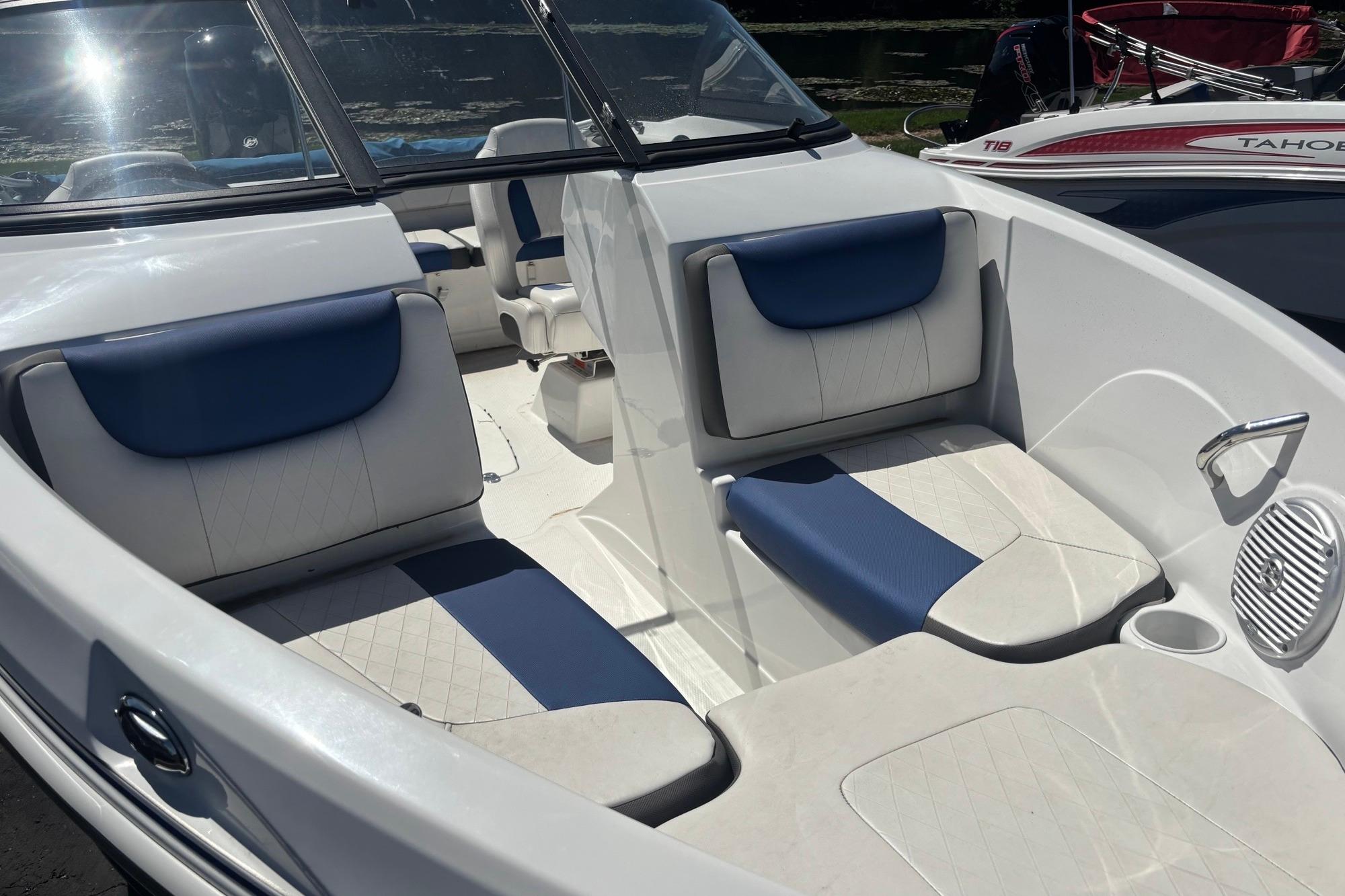 2024 Tahoe 200 S boat interior with blue and white seating.