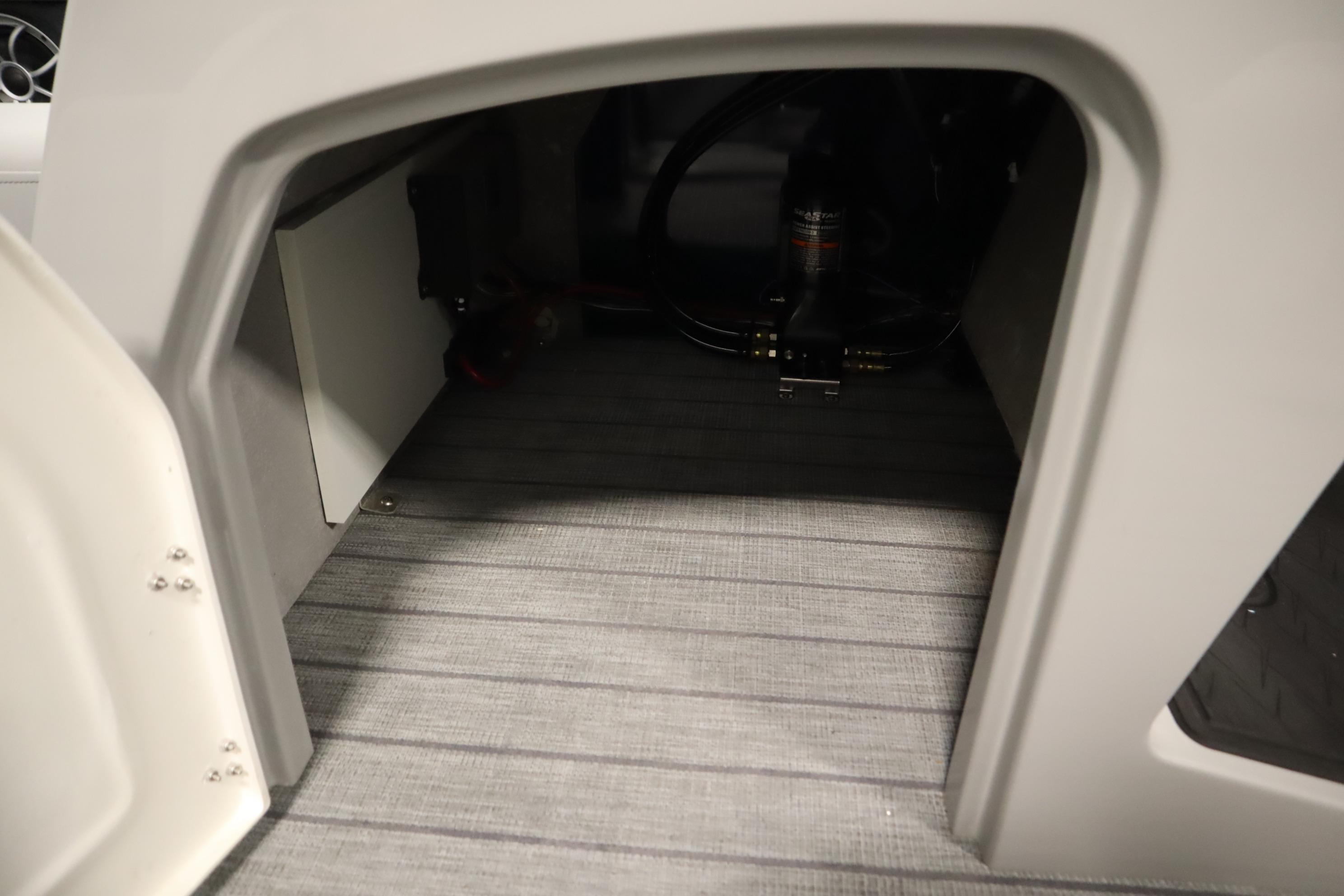 Interior storage compartment of 2025 Bentley Pontoons Elite 253 Admiral Tri-toon.