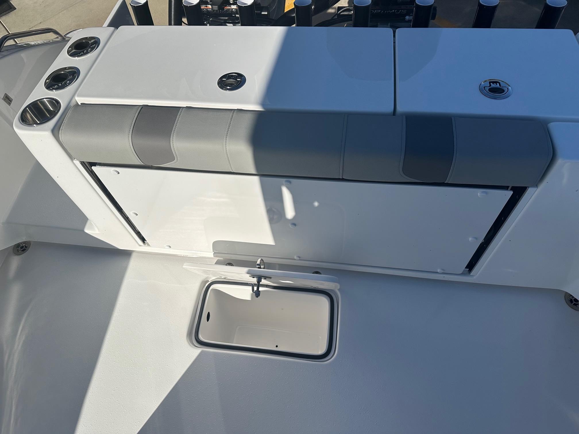 2025 Cape Horn 28XS boat interior with seating and storage compartments.