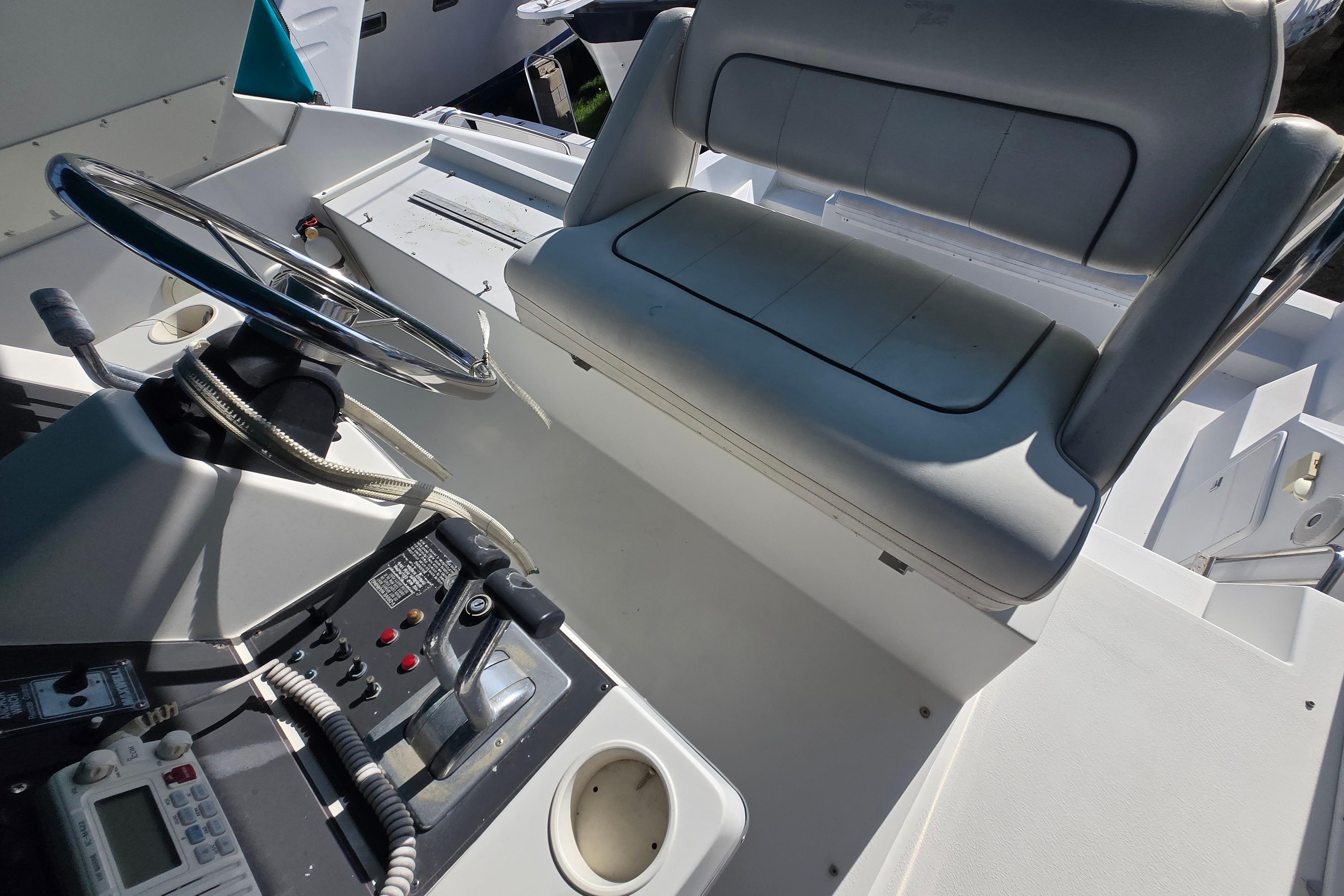 1994 Carver 380 Santego helm with steering wheel and control panel.