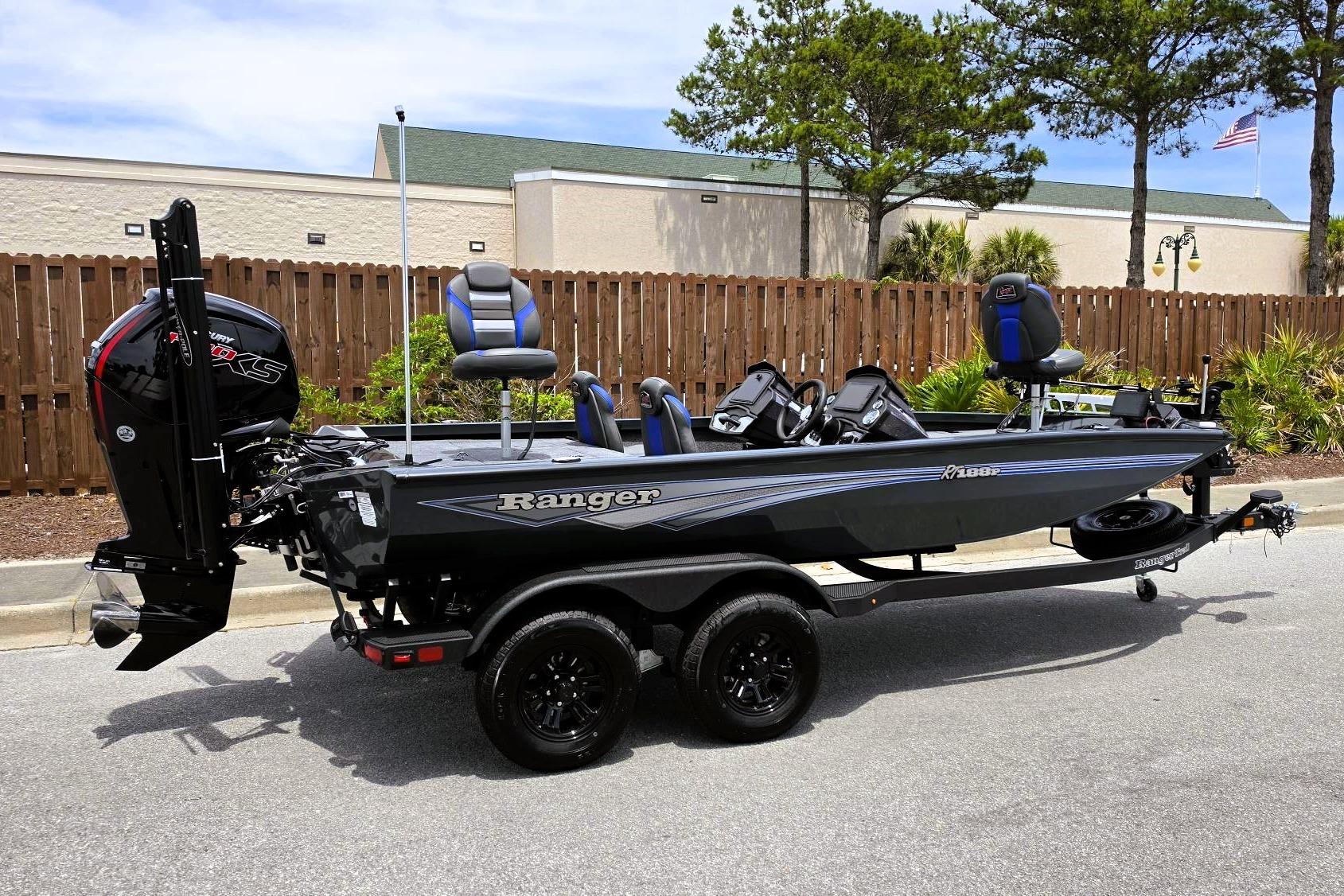 2026 Ranger RT188P fishing boat on trailer, parked outdoors, featuring sleek design and modern equipment.