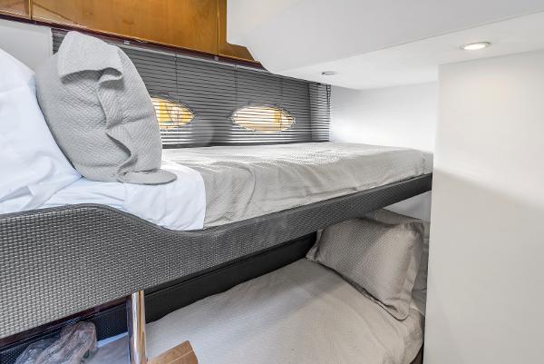 Interior of 2013 Princess V57 yacht with bunk beds.