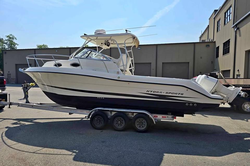 2003 Hydra-Sports Vector 2800 WA boat on trailer, parked outdoors.