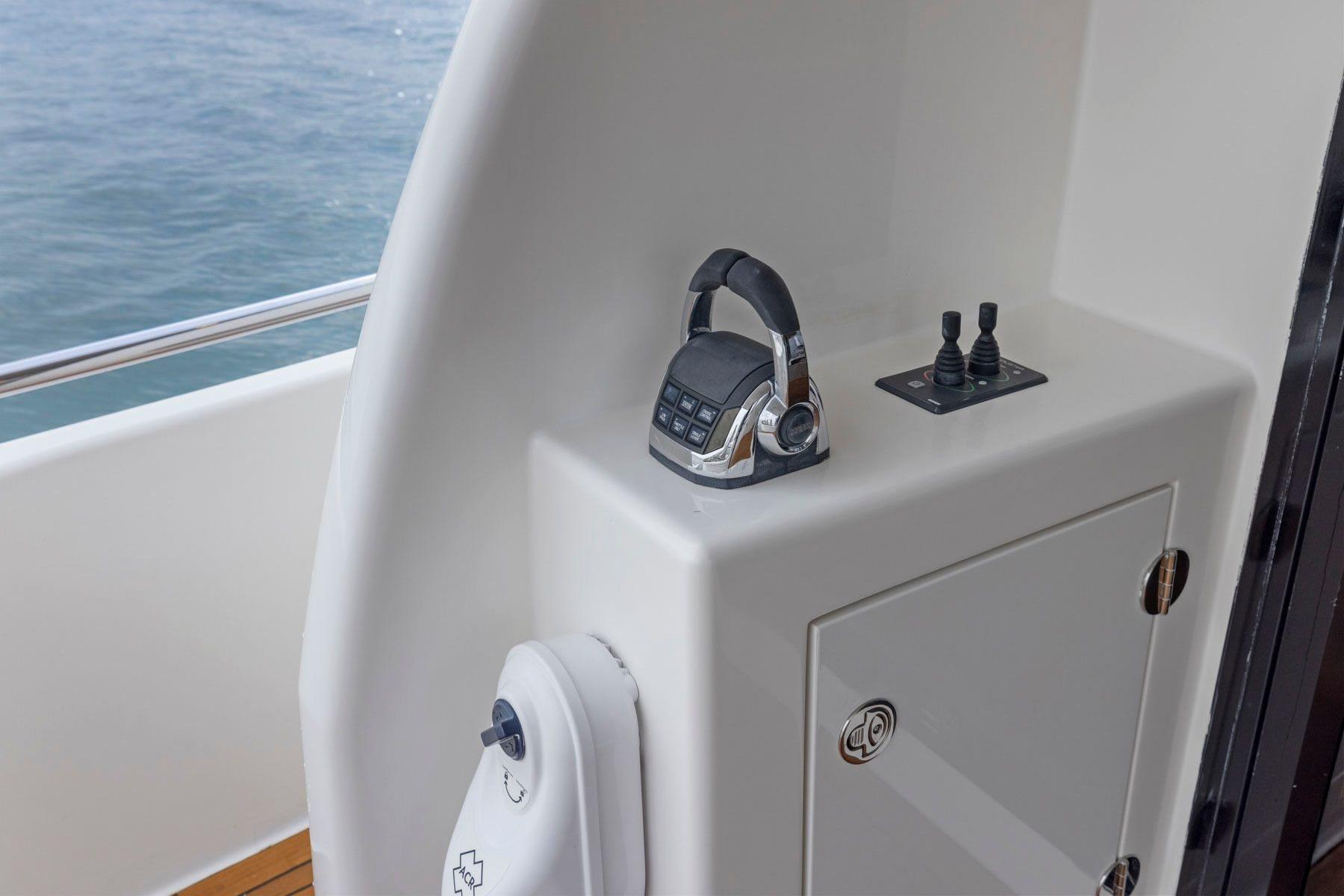 2014 Maritimo M50 yacht control panel with throttle and joystick.