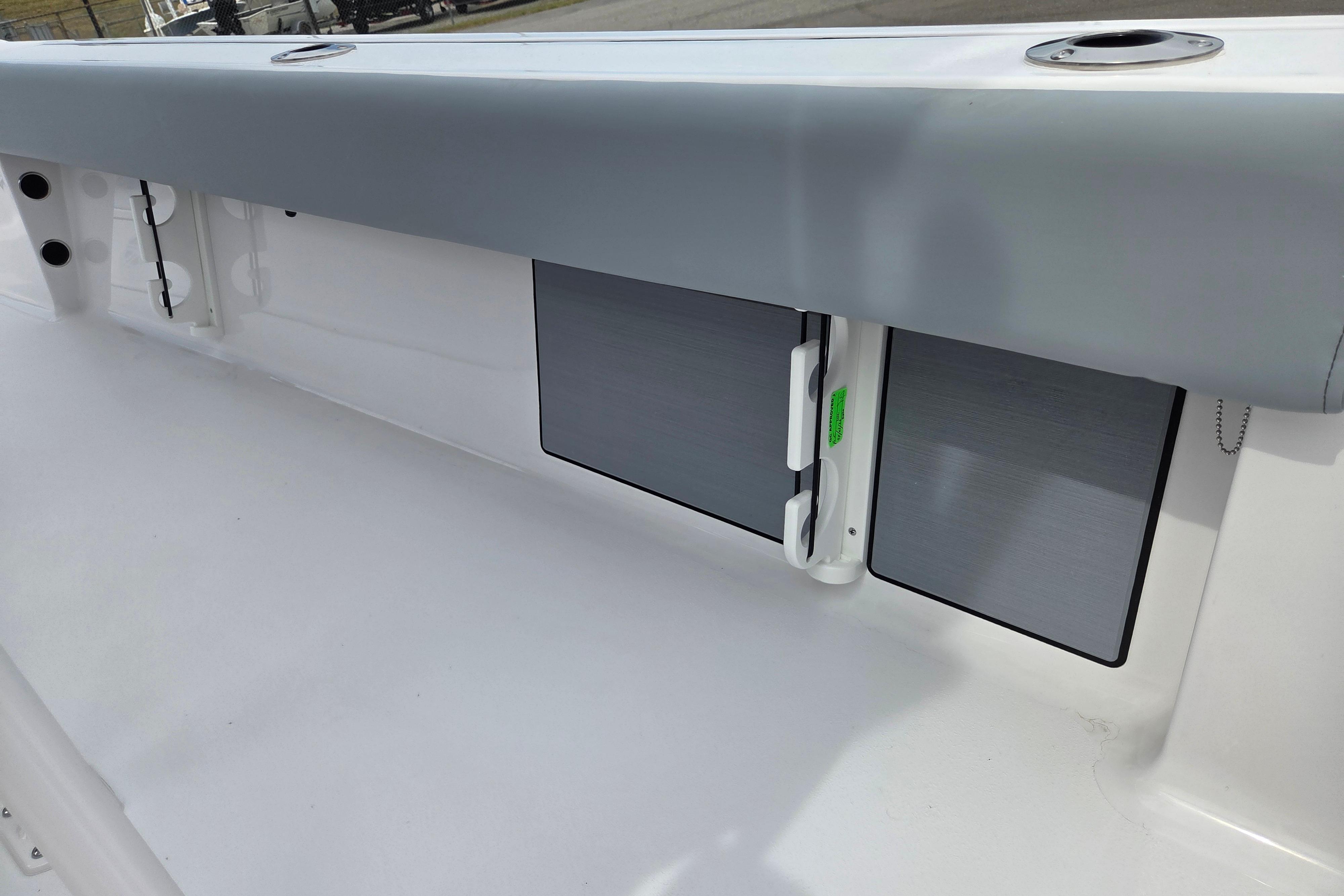 2026 Sportsman Masters 247OE Bay Boat interior detail with storage compartments.