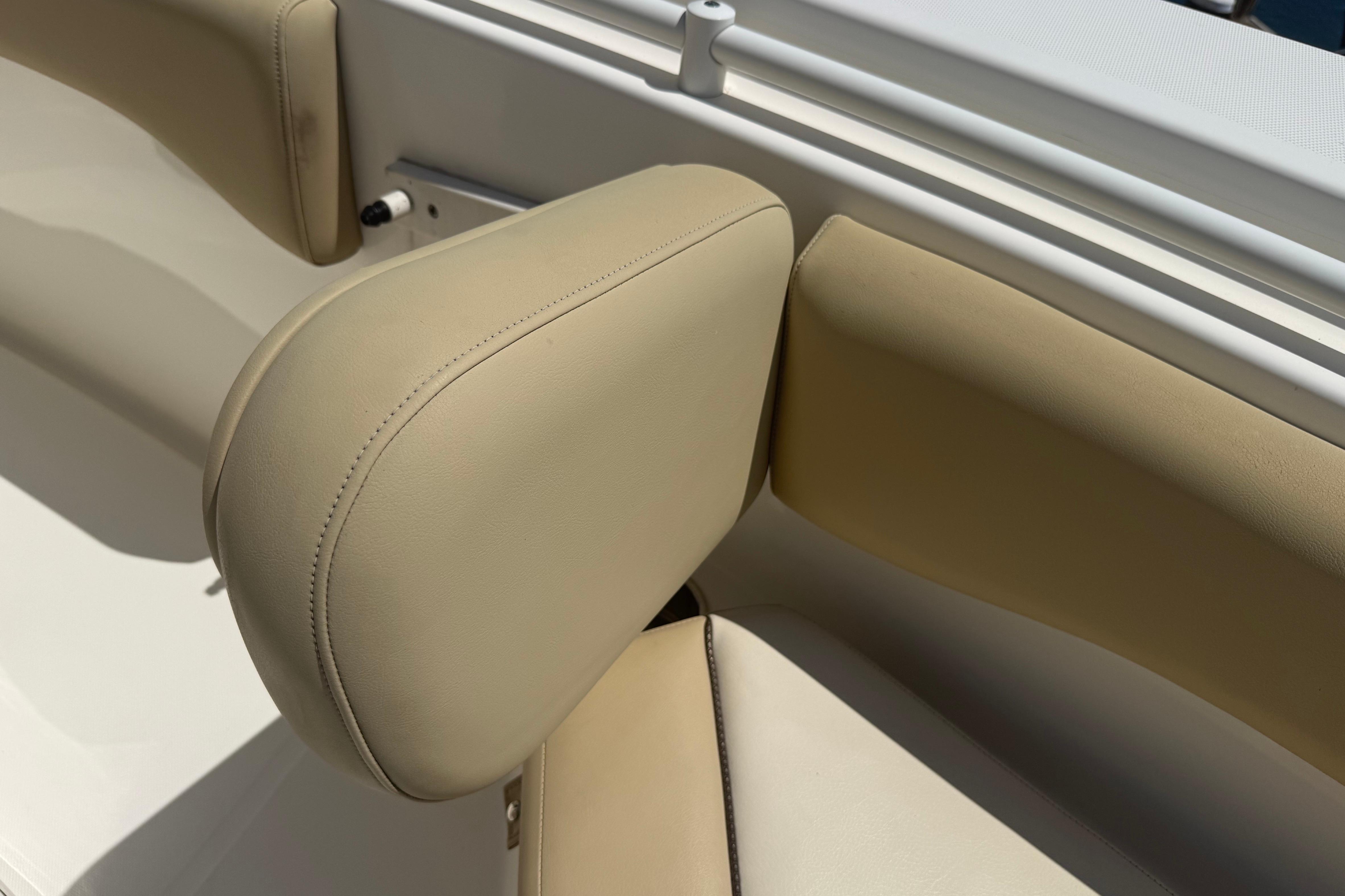 2019 Key West Billistic 281 Center Console boat seating detail, beige upholstery.