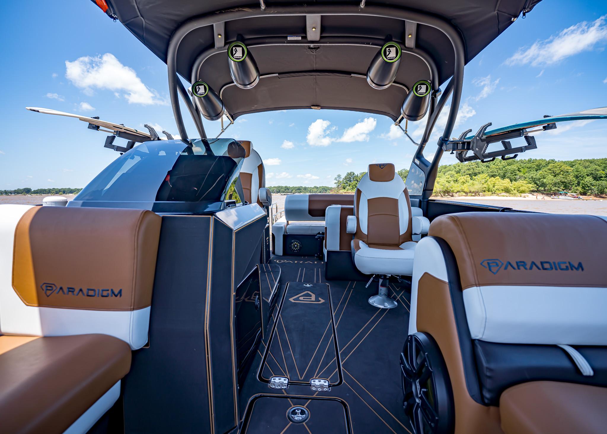 Luxurious interior of 2025 Paradigm 236 boat with modern seating and sleek design.