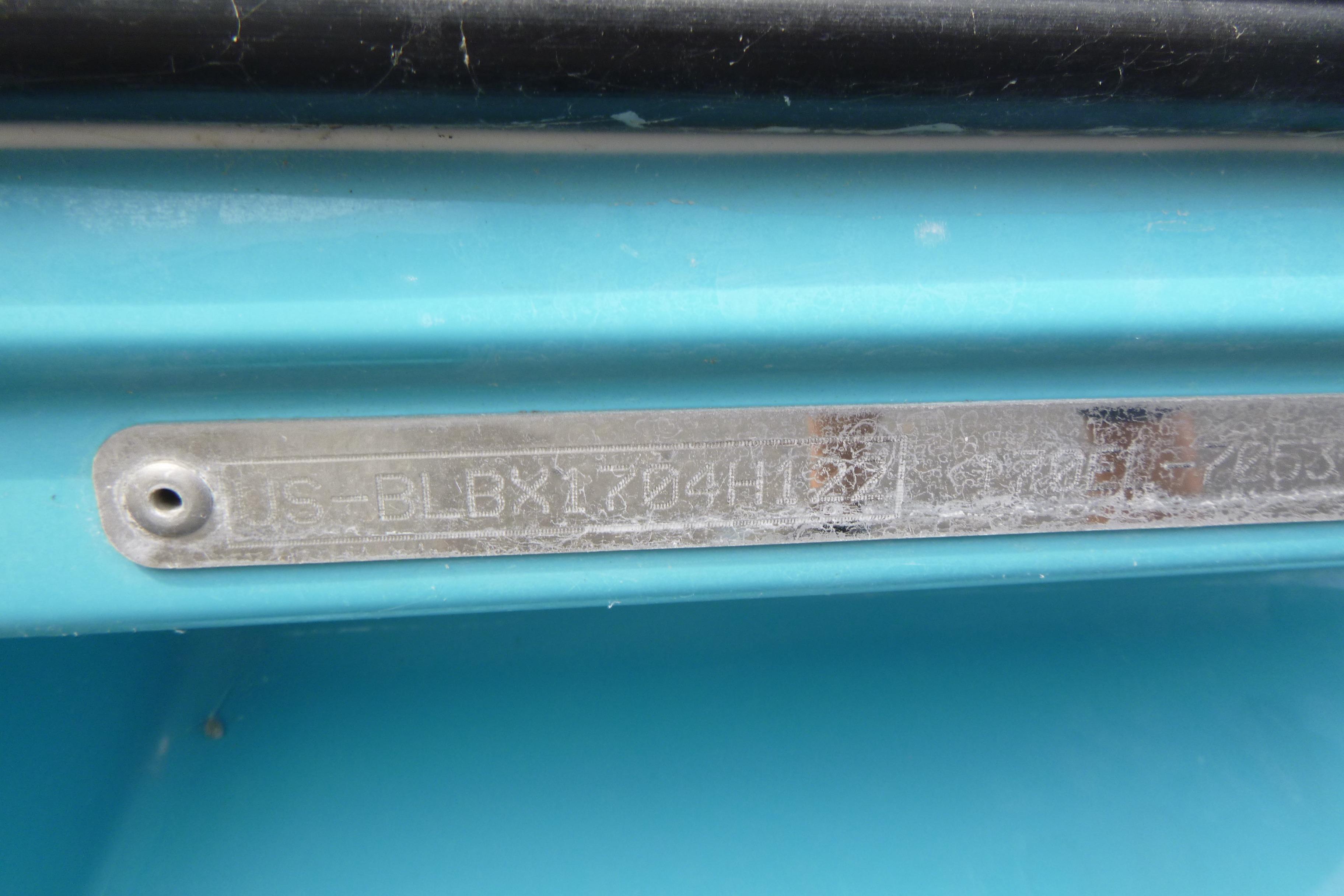 2022 Bayliner Element M17 hull identification number on blue surface.