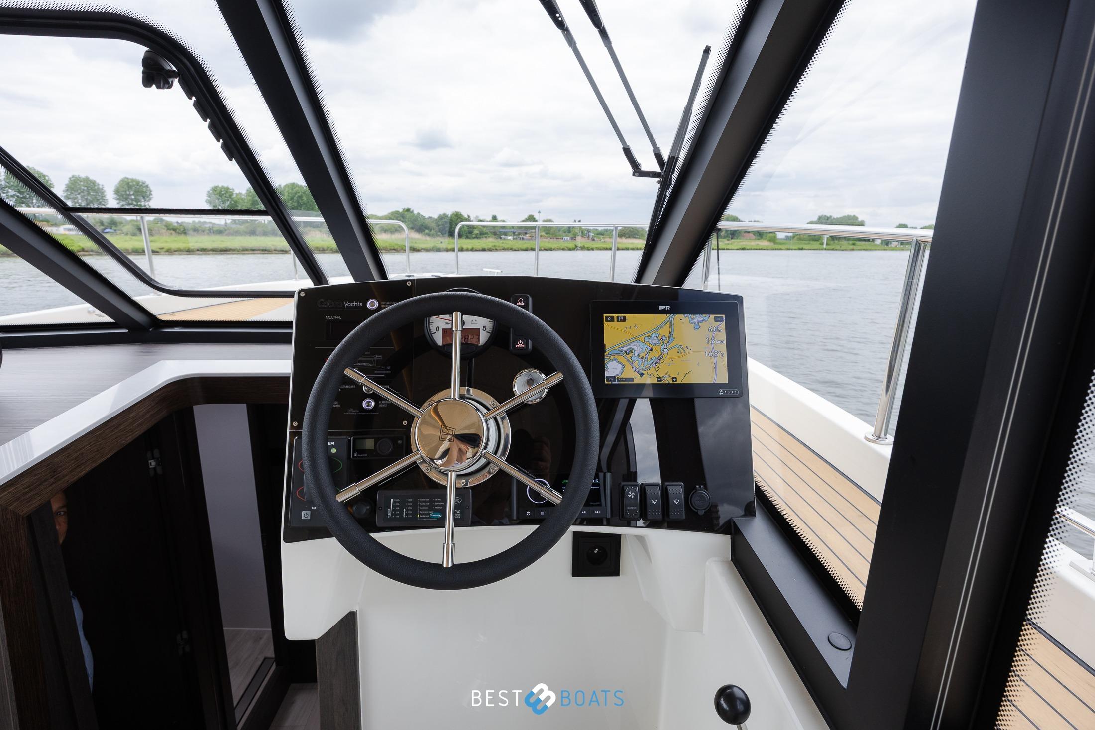 Helm of 2023 Cobra Yachts Futura 36 Premium Fly with navigation display.
