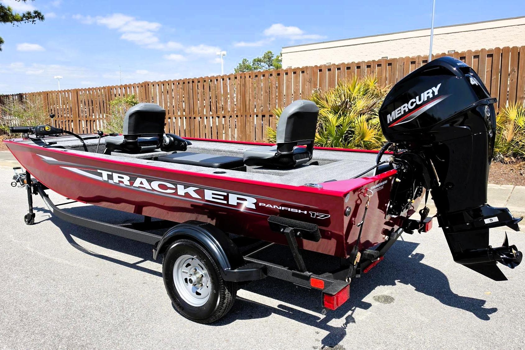 2026 Tracker Panfish 17 boat with Mercury engine, parked outdoors on a sunny day.