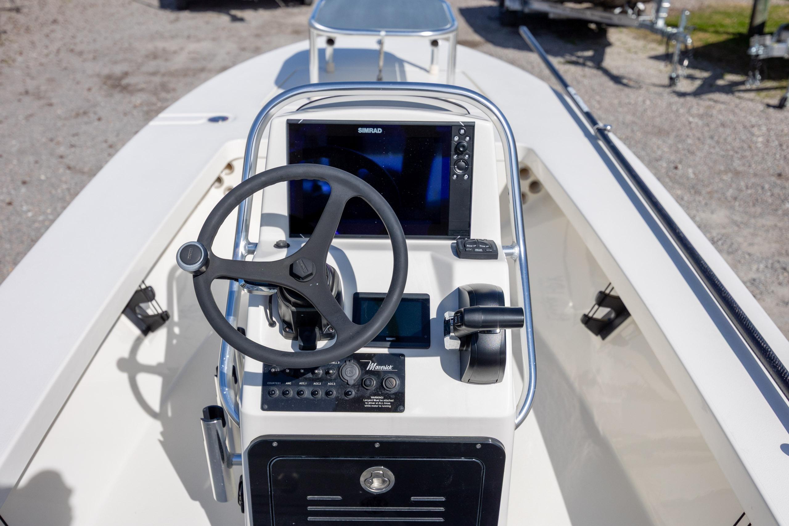 2024 Maverick 17 HPX-S boat console with steering wheel and navigation system.