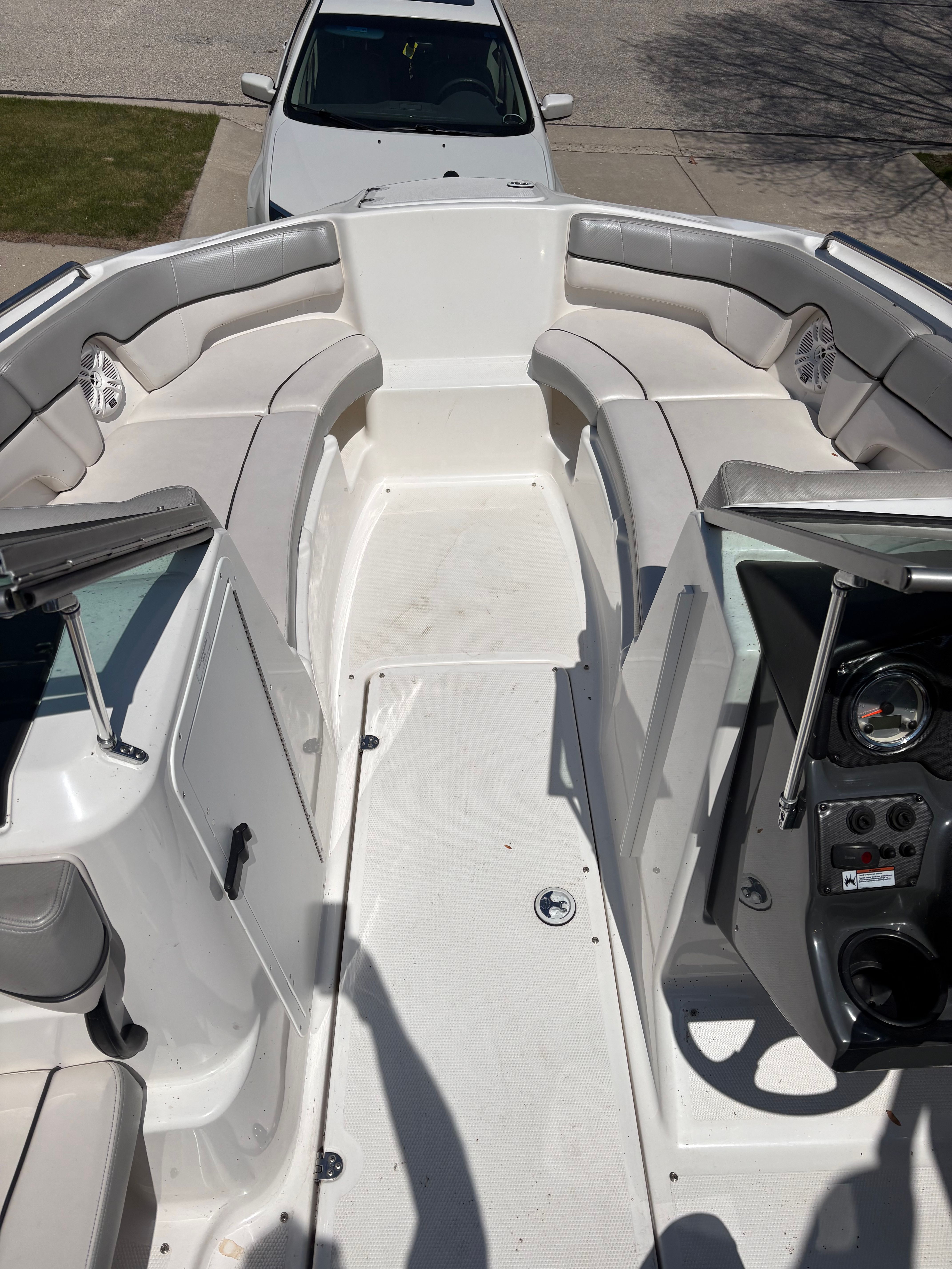 Interior view of a 2012 Yamaha AR210 boat with seating area.