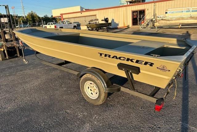 2026 Tracker Grizzly 1754 Utility boat on trailer in outdoor setting.