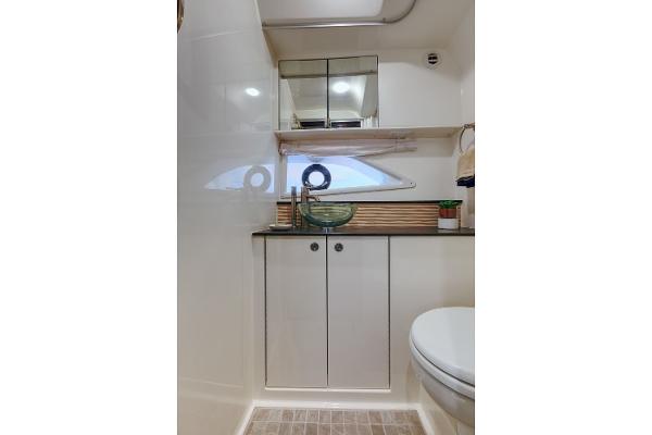 Manufacturer Provided Image: 2023 Sea Ray Sundancer 320 bathroom with modern fixtures and ample storage.