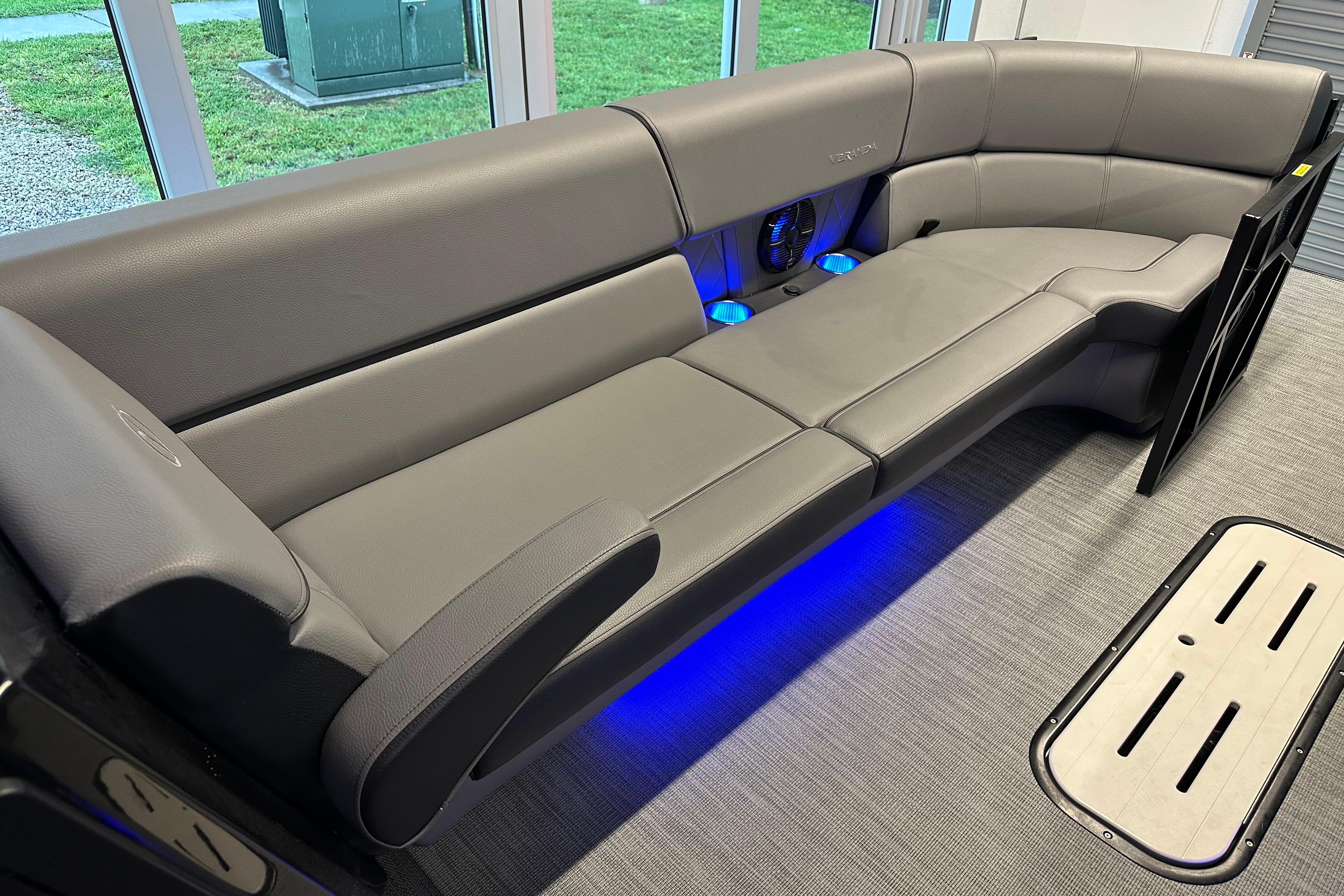Luxurious seating in 2025 Veranda VX 27 DCRC with ambient blue lighting.