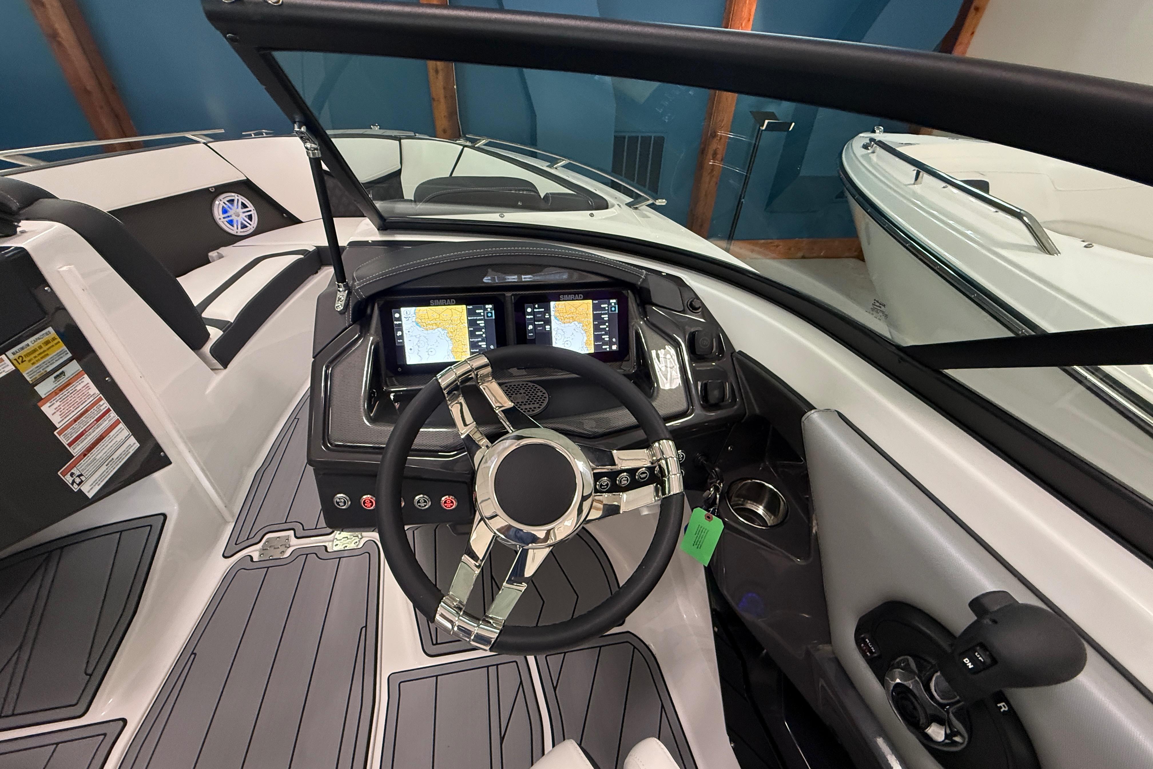2025 Monterey 235SS Super Sport boat interior with modern dashboard and steering wheel.
