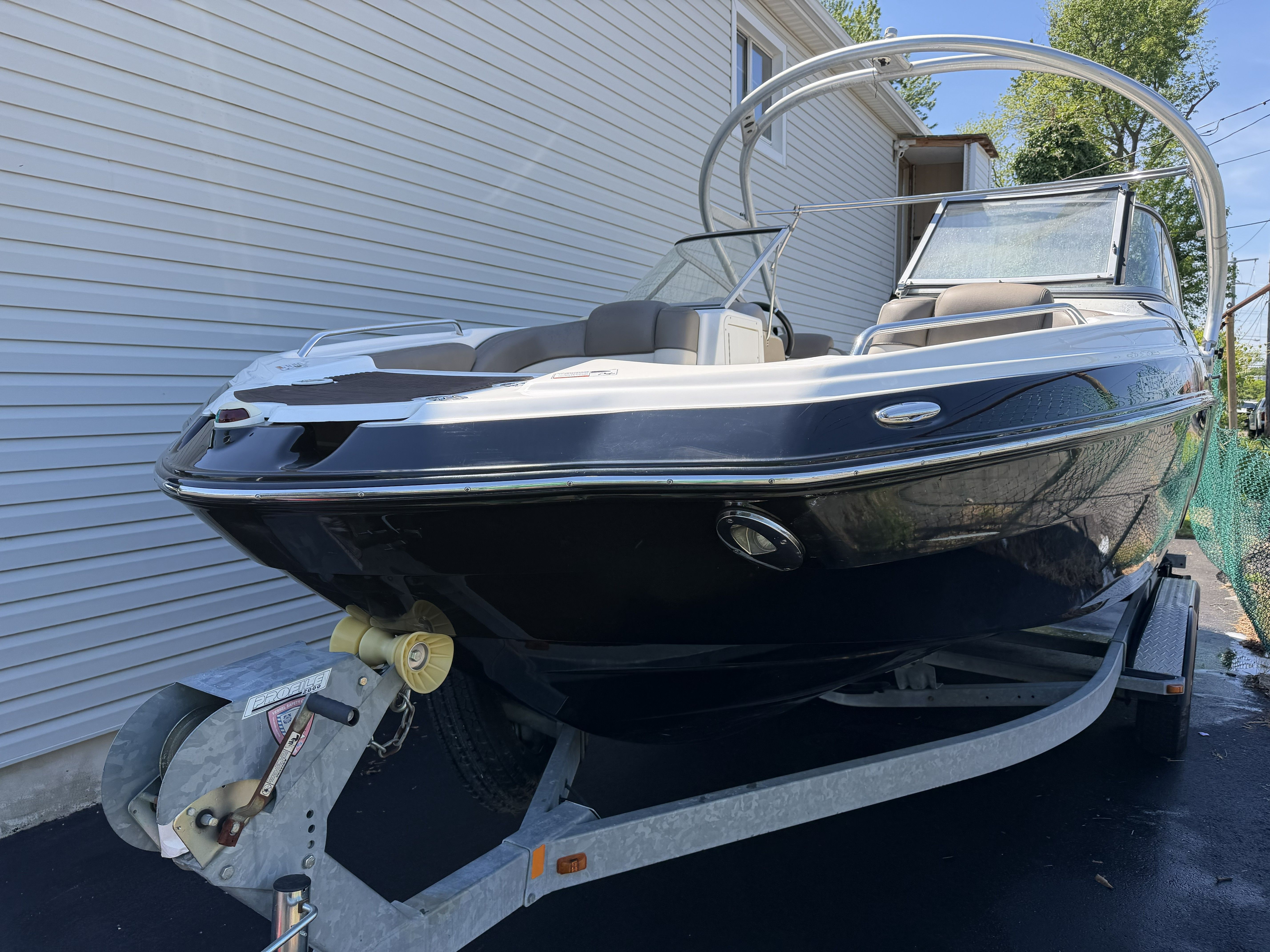 2012 Yamaha 242 boat parked on a trailer.