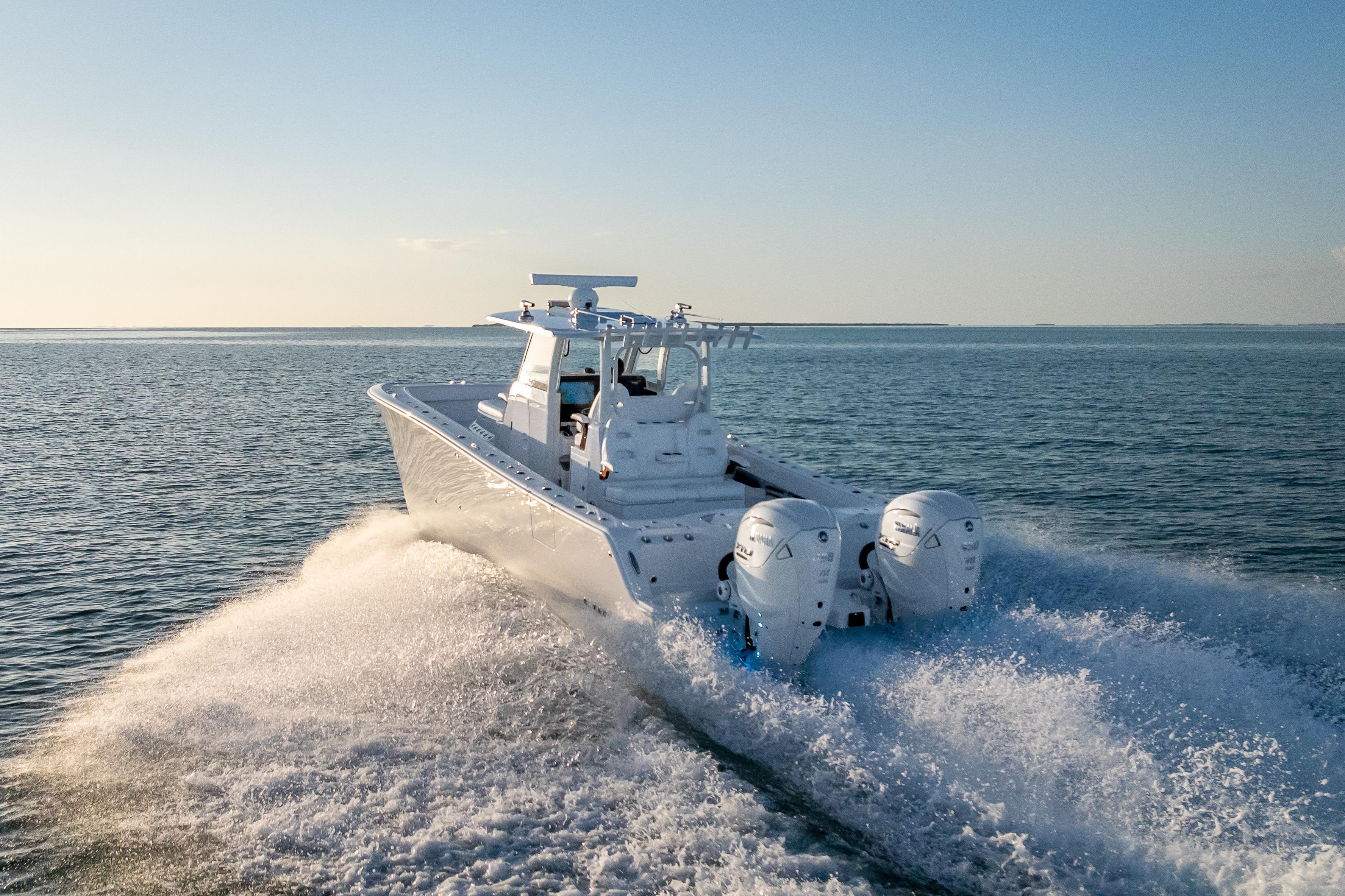 2026 Freeman 35 boat cruising on open water at high speed.