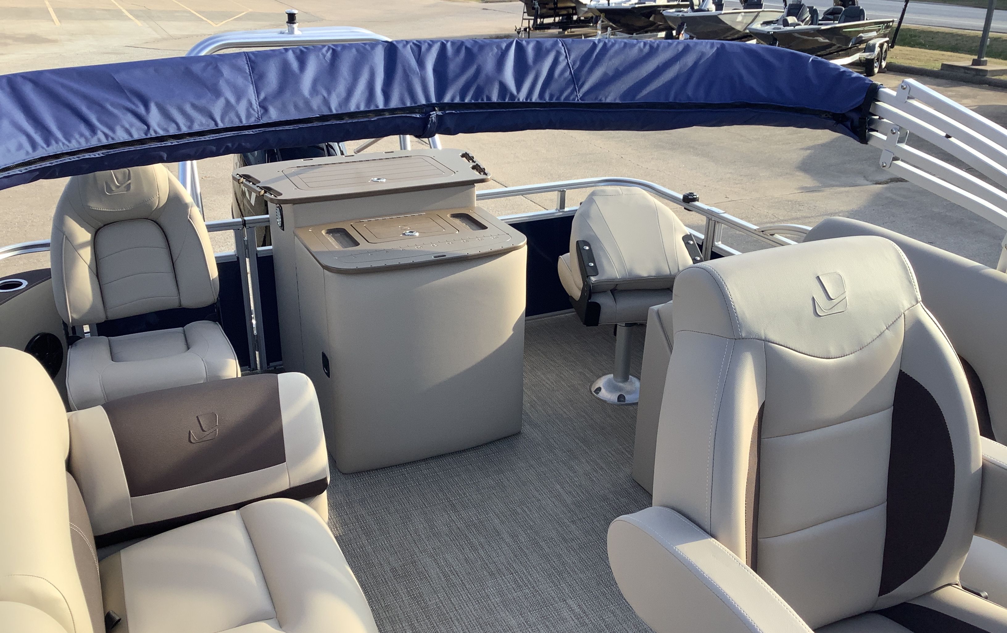 Interior of 2026 Landau Alure 23CC Fish with comfortable seating.