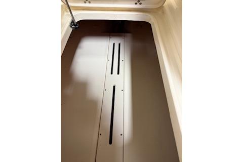 2021 Scout 215 Dorado storage compartment interior with sleek design and ventilation slots.