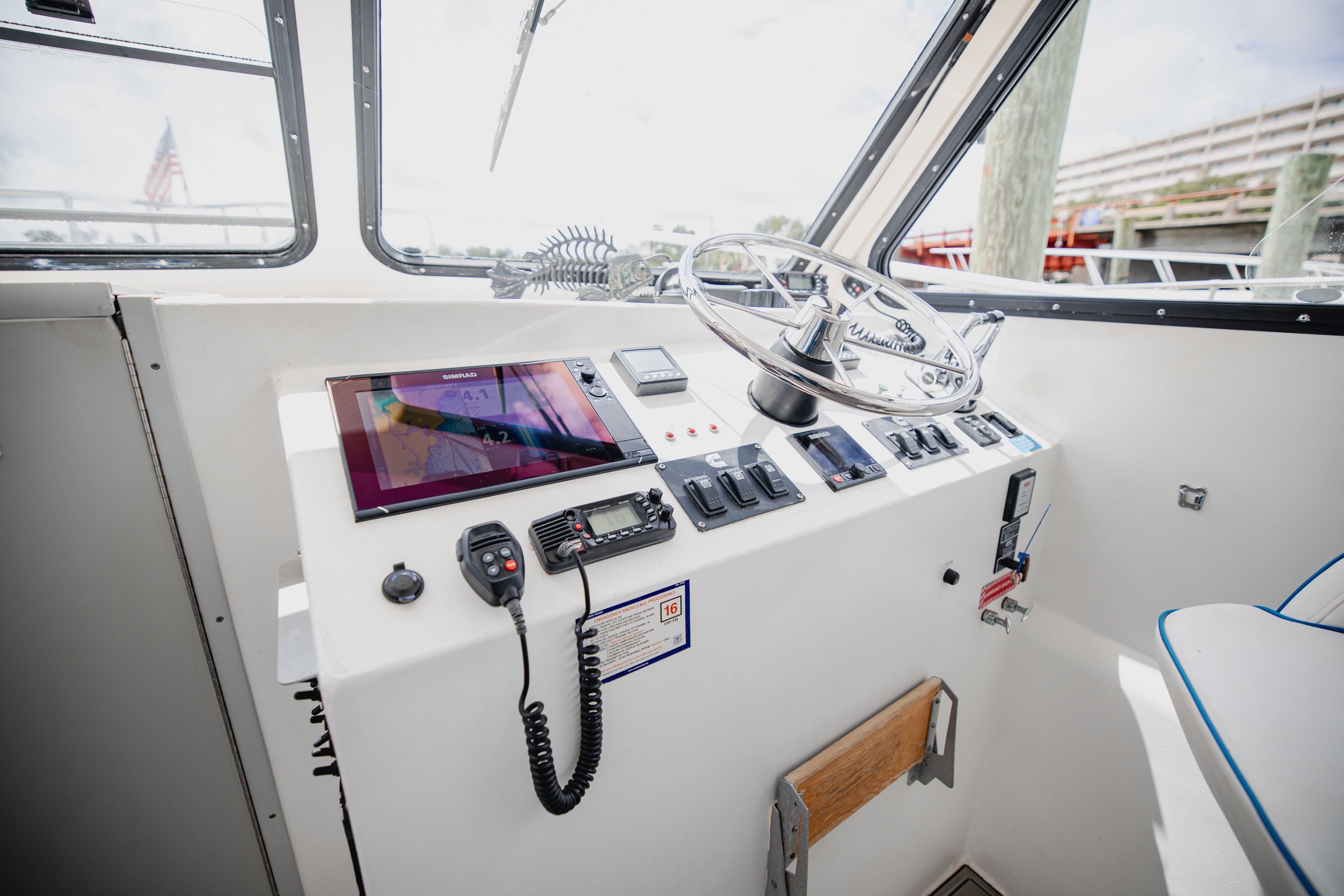 The helm of a 2019 Newton 36' Dive Special with modern electronics and controls.