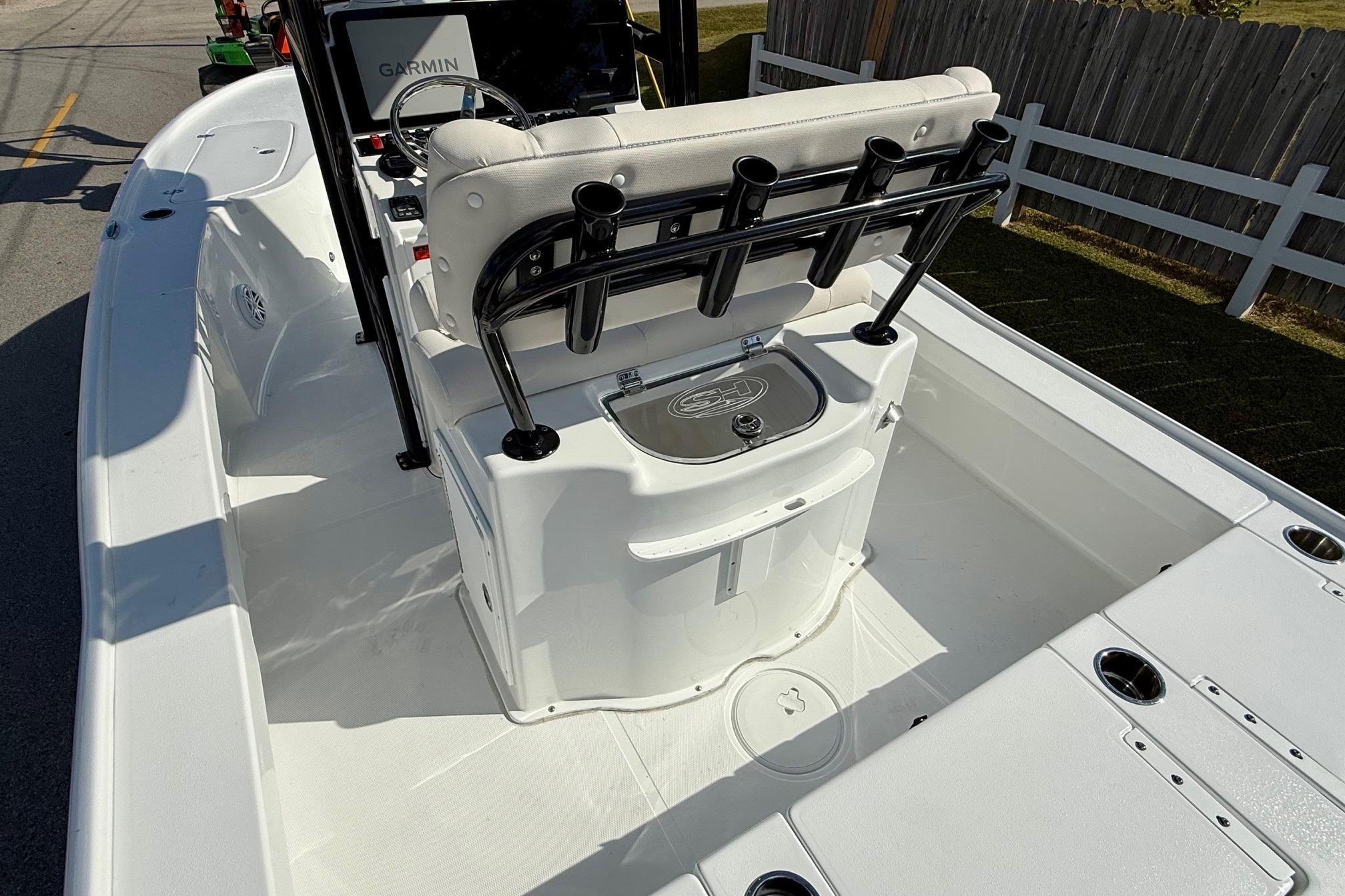 2026 Sea Hunt BX 22 BR boat interior with Garmin equipment and rod holders.