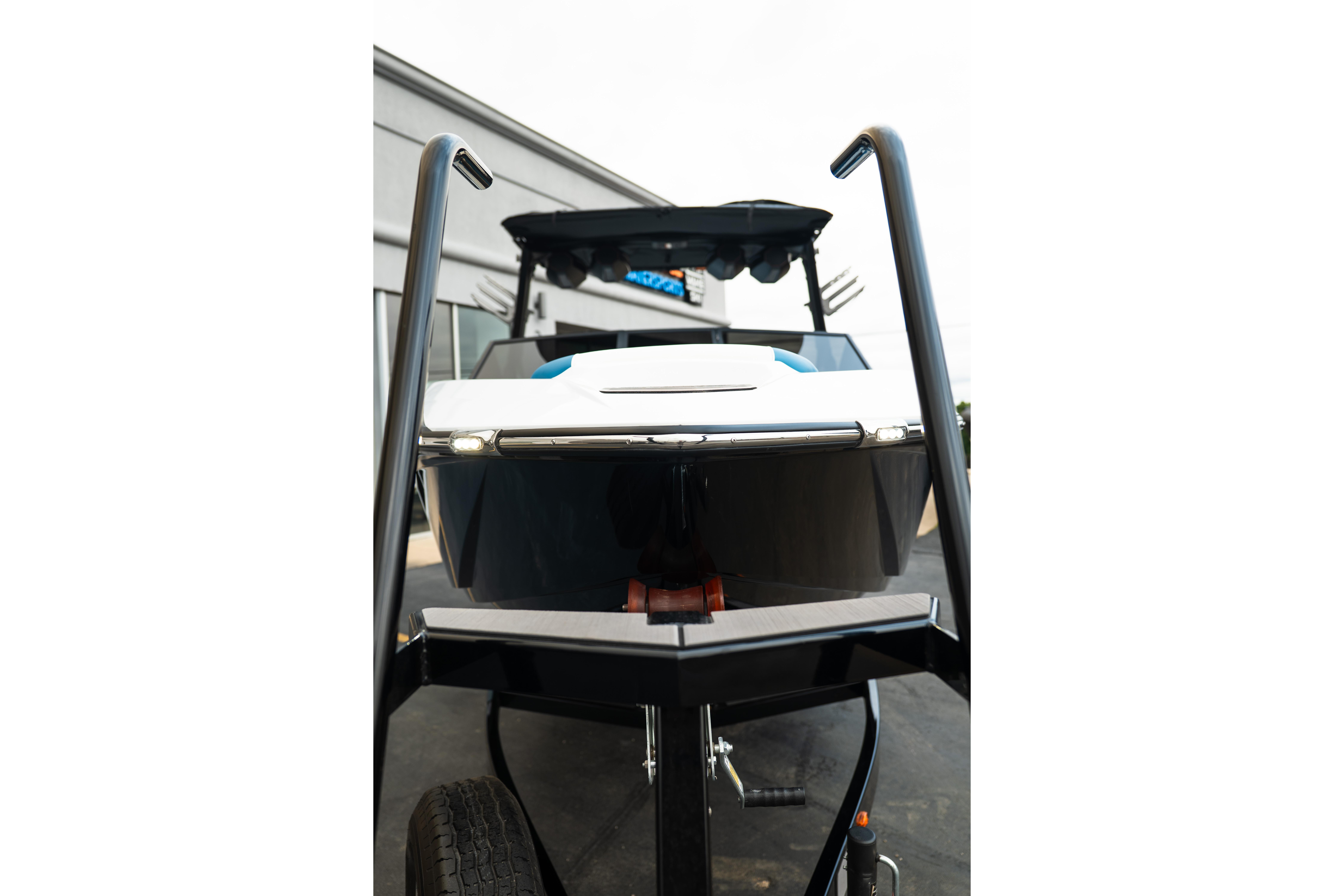 2024 Tigé Z5 boat on trailer, viewed from the front, showcasing sleek design.