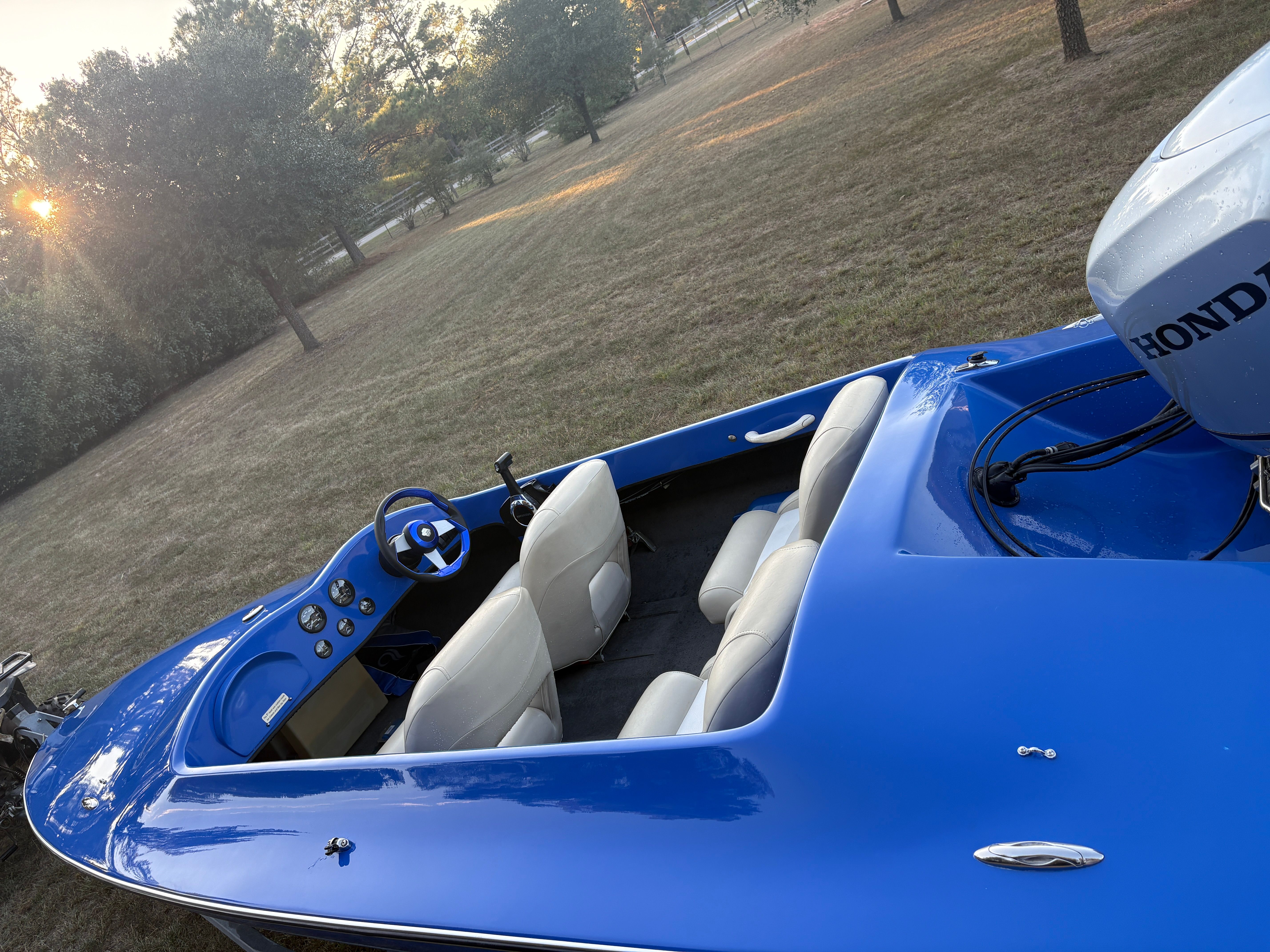 Blue 2017 Revel T2 boat with Honda engine.
