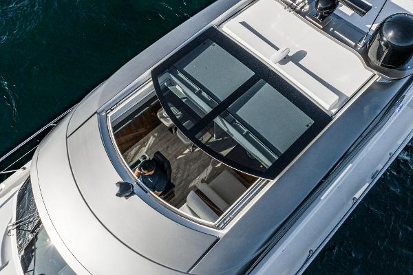 Aerial view of 2021 Riviera 5400 Sport Yacht on the water.