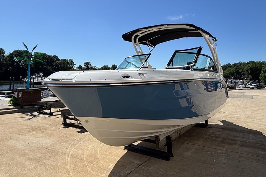 2027 Sea Ray SDX 230 Outboard boat on display, featuring sleek design and modern amenities.