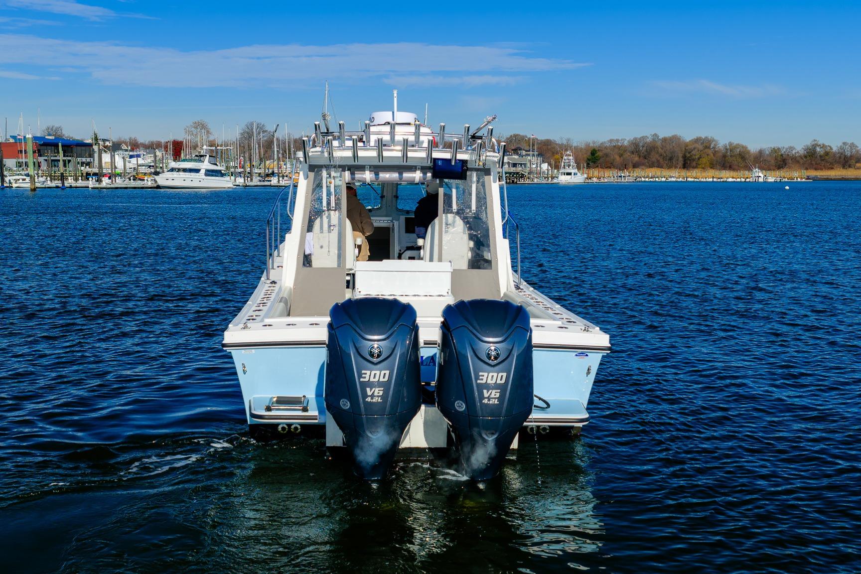 2024 Steiger Craft 31 Fisherman with dual 300 V6 engines on the water.