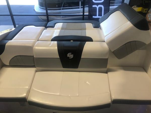 2023 Chaparral 21 Surf boat interior seating, featuring modern design and comfortable upholstery.