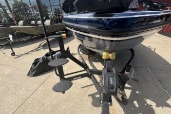2026 Nitro ZV19 Sport Pro boat on trailer, parked outdoors.