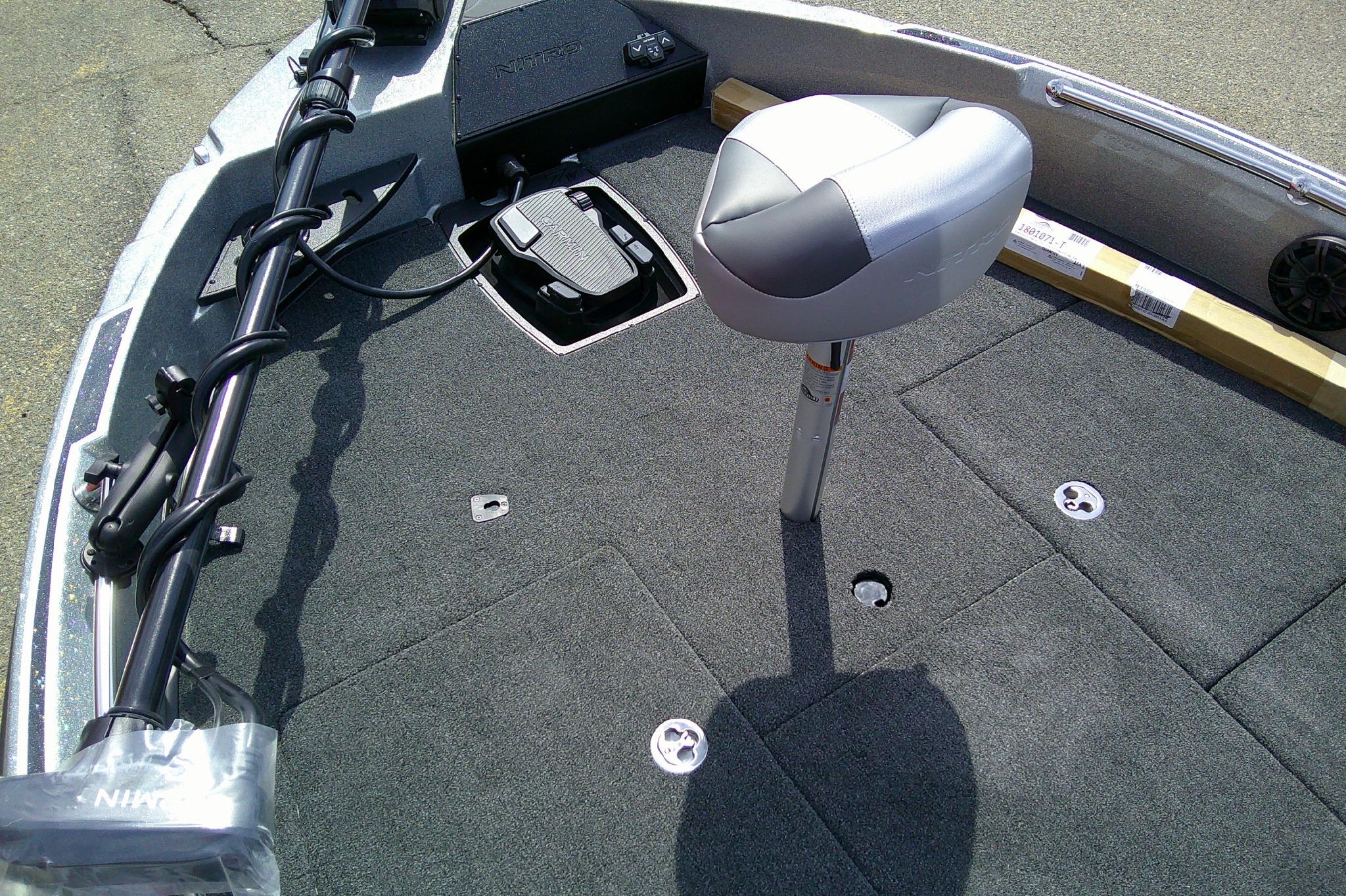 Front deck of 2026 Nitro ZV21 Pro boat with seat and trolling motor.
