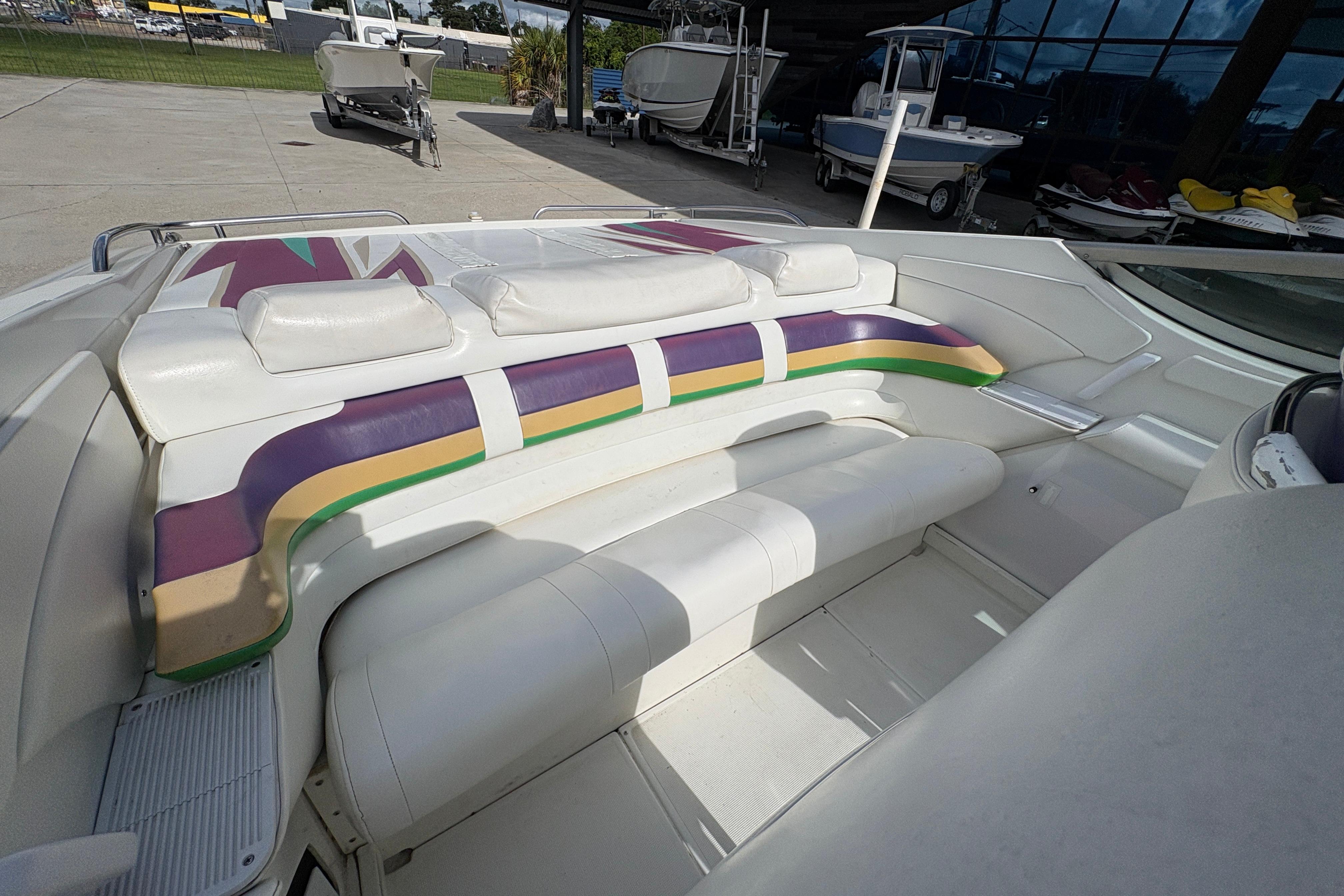 2002 Formula 292 FASTech boat interior with colorful seating and sleek design.