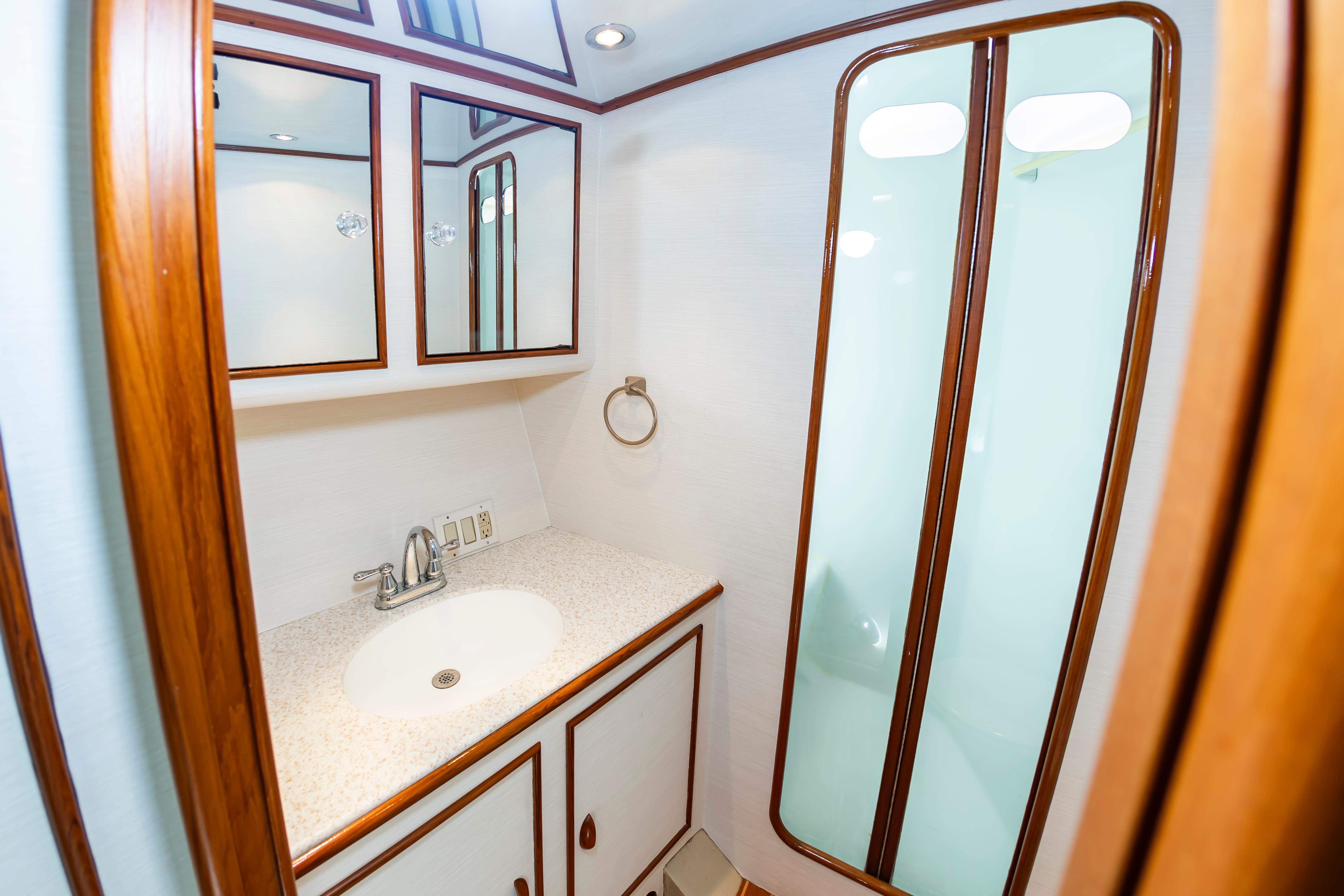 Luxurious bathroom in 1993 Custom Carolina Scarborough 56 Convertible yacht.