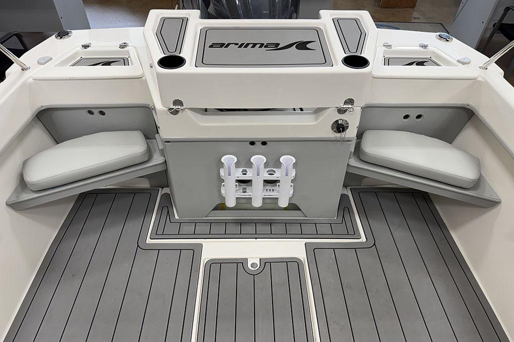 Manufacturer Provided Image: 2026 Arima Sea Ranger 21 Yellowtail Edition boat interior with seating and rod holders.