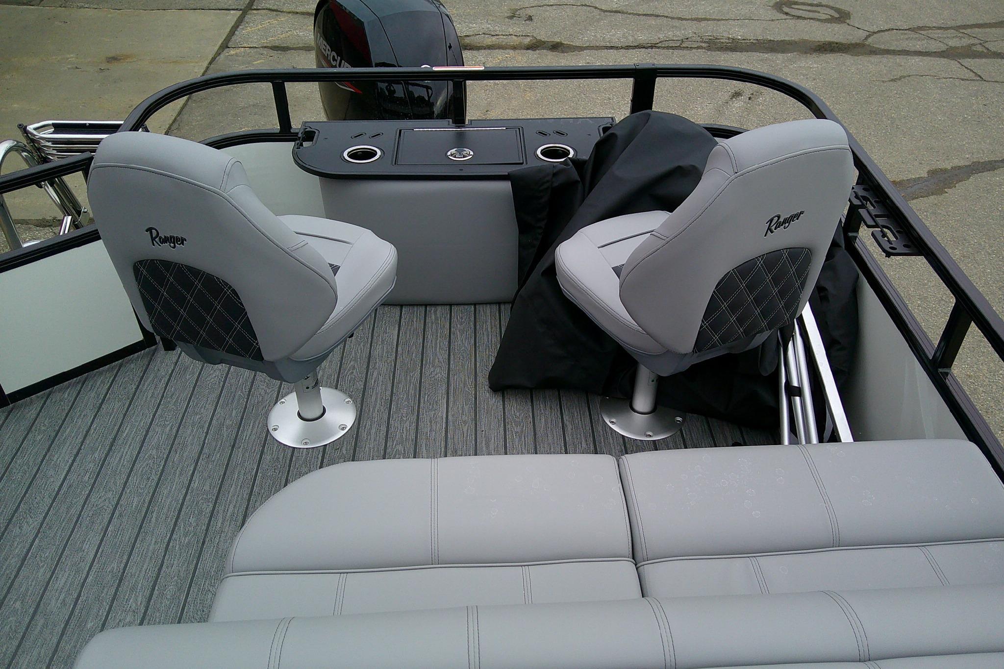 2026 Ranger 220F boat interior with gray seating and console.