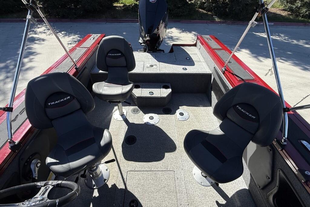 2024 Tracker Targa V-19 WT boat interior with four seats and fishing rod holders.