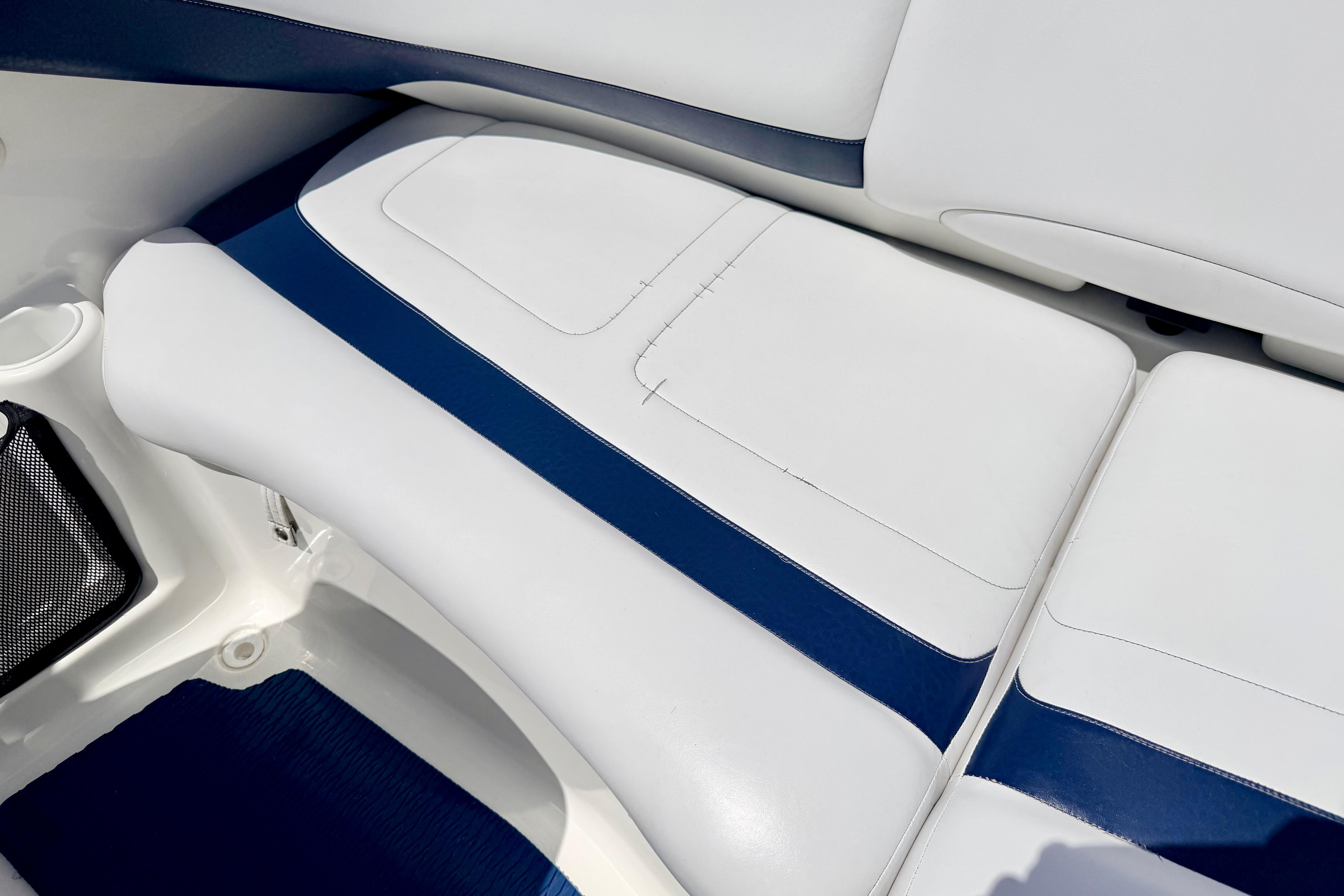 2004 Bombardier SEADOO Utopia 185 boat interior with white and blue seating.