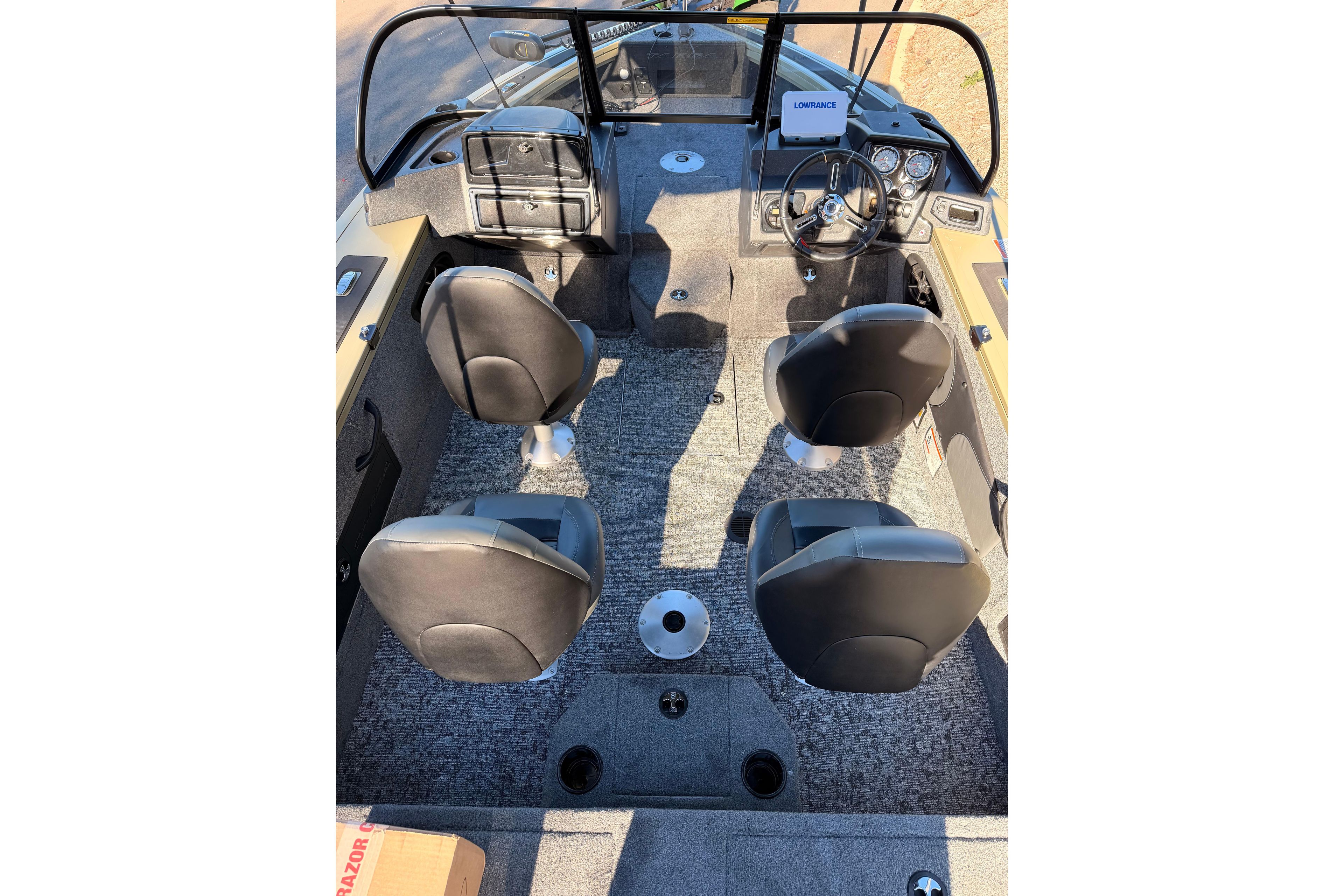 Interior of 2026 Tracker Targa V-19 Combo boat with four seats and dashboard.