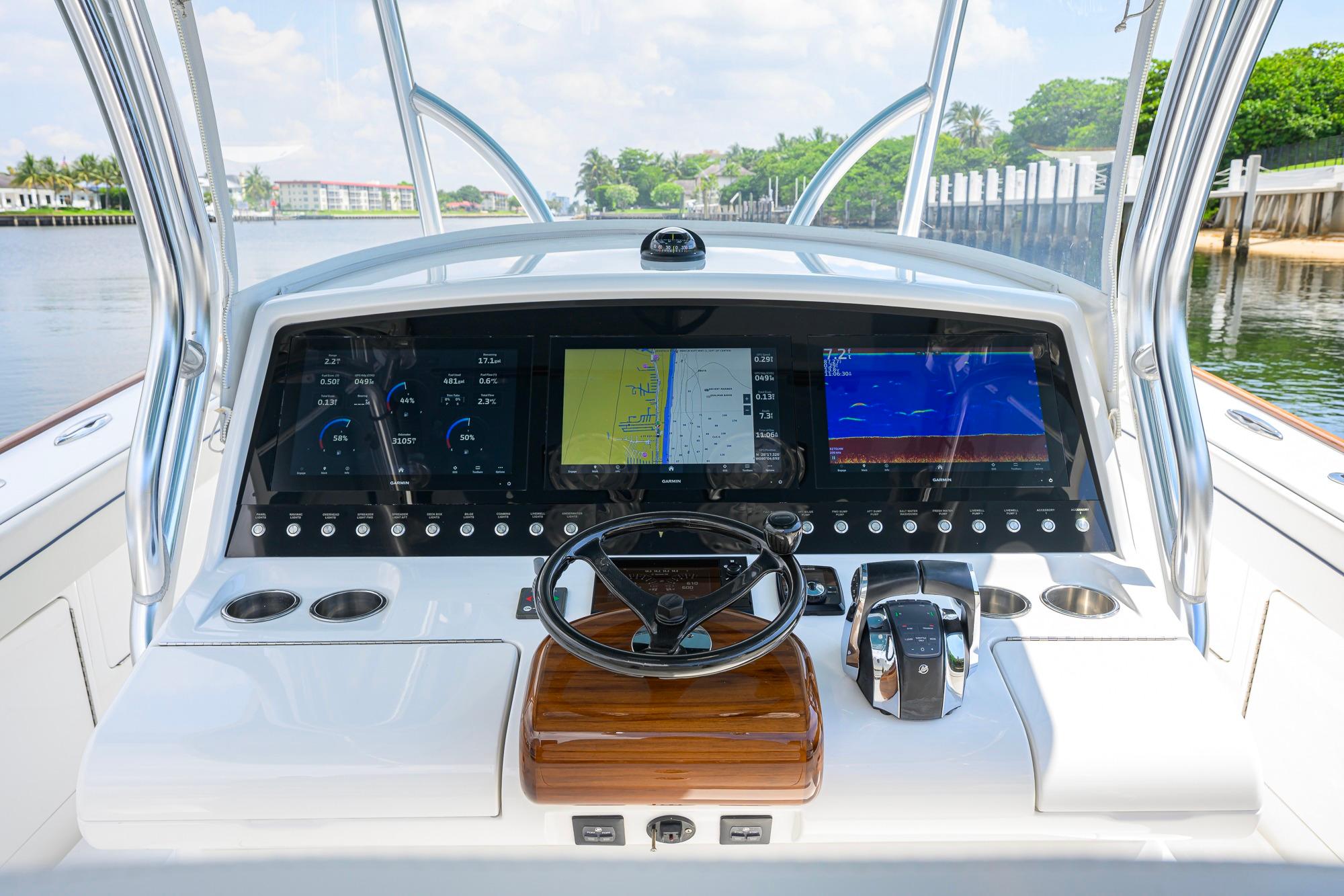 2020 Valhalla Boatworks V-41 helm with advanced navigation displays and controls.
