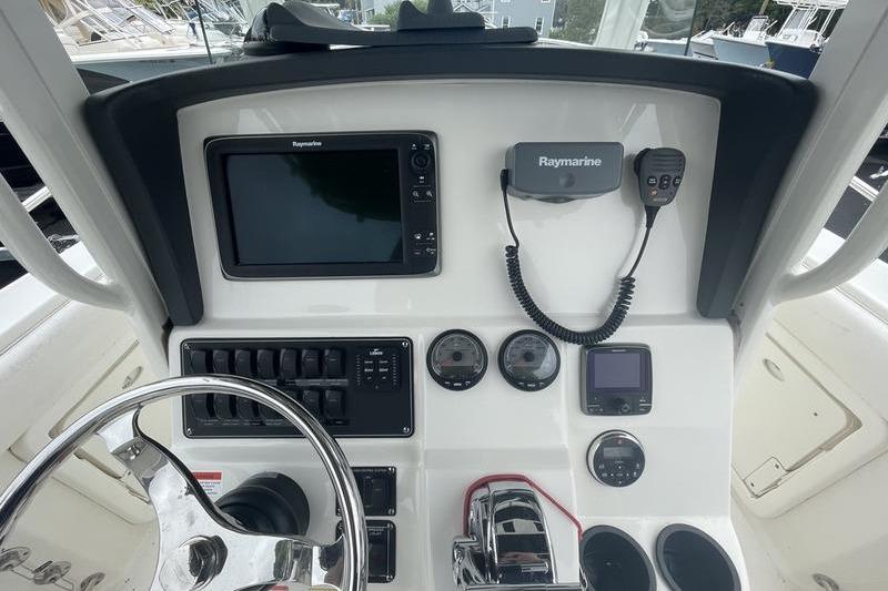 Control panel of a 2012 Boston Whaler 250 Outrage with Raymarine electronics.