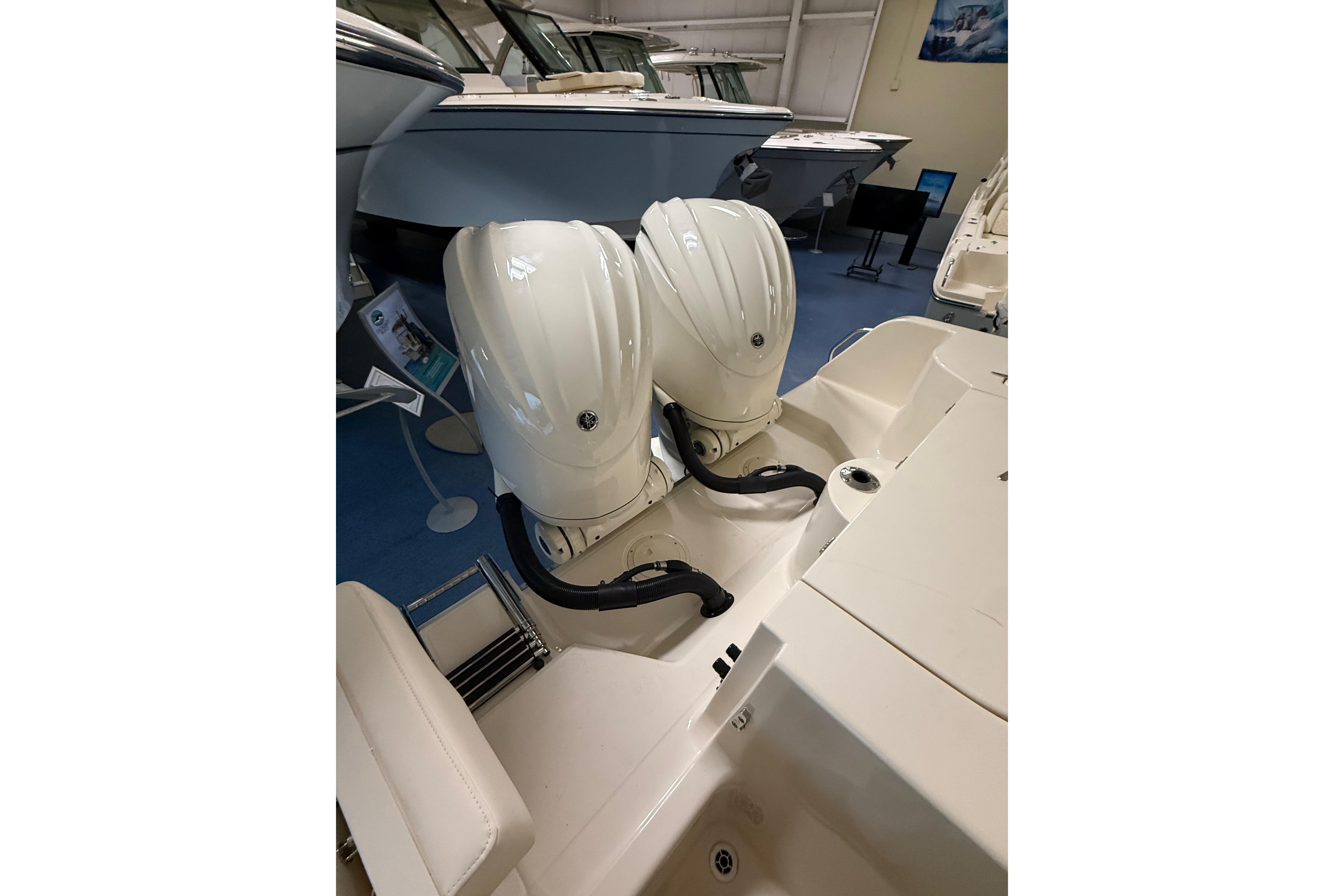 2026 Grady-White Freedom 285 with dual engines in showroom.