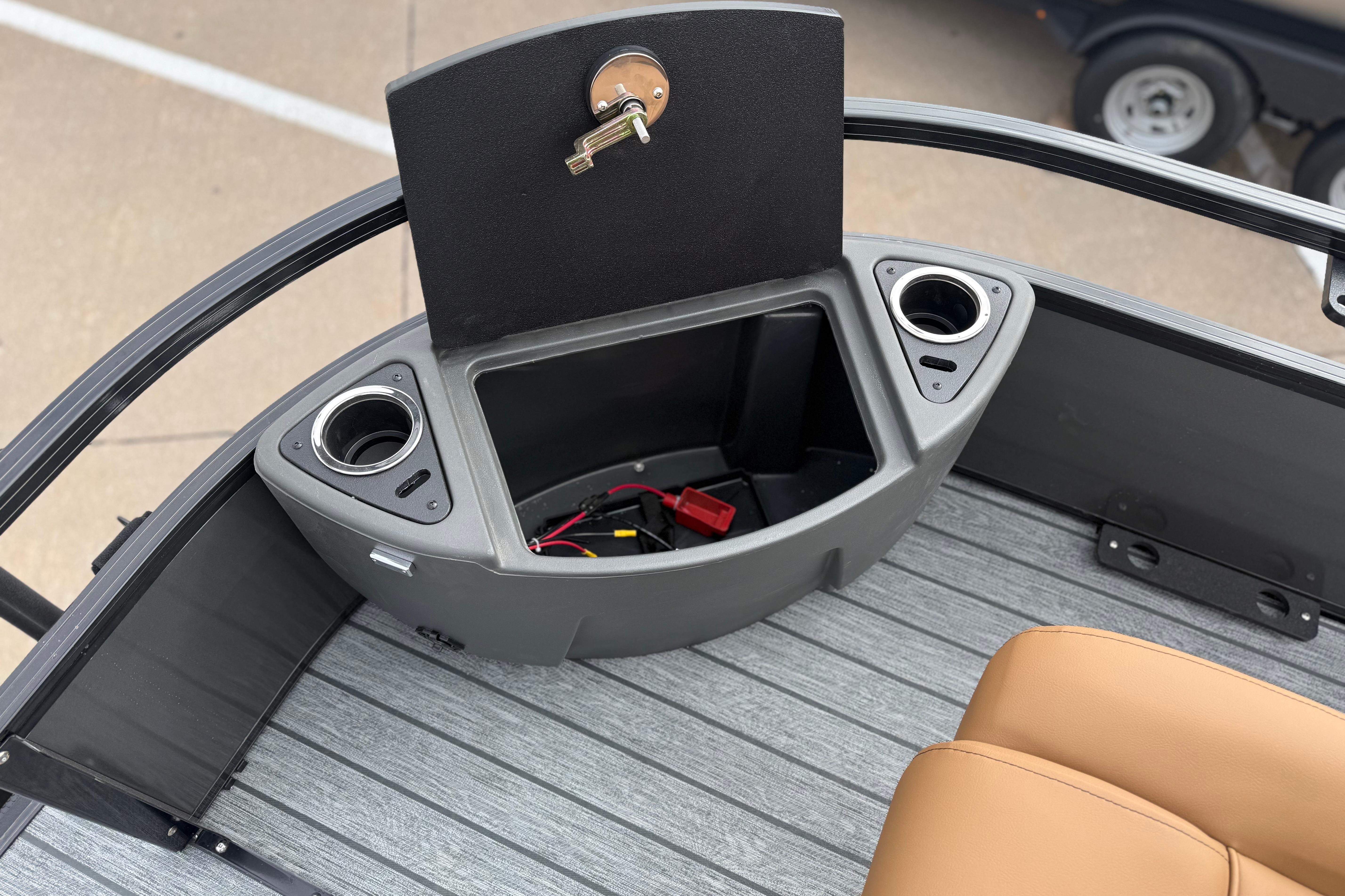 Storage compartment and cup holders on 2026 Ranger 220F boat deck.